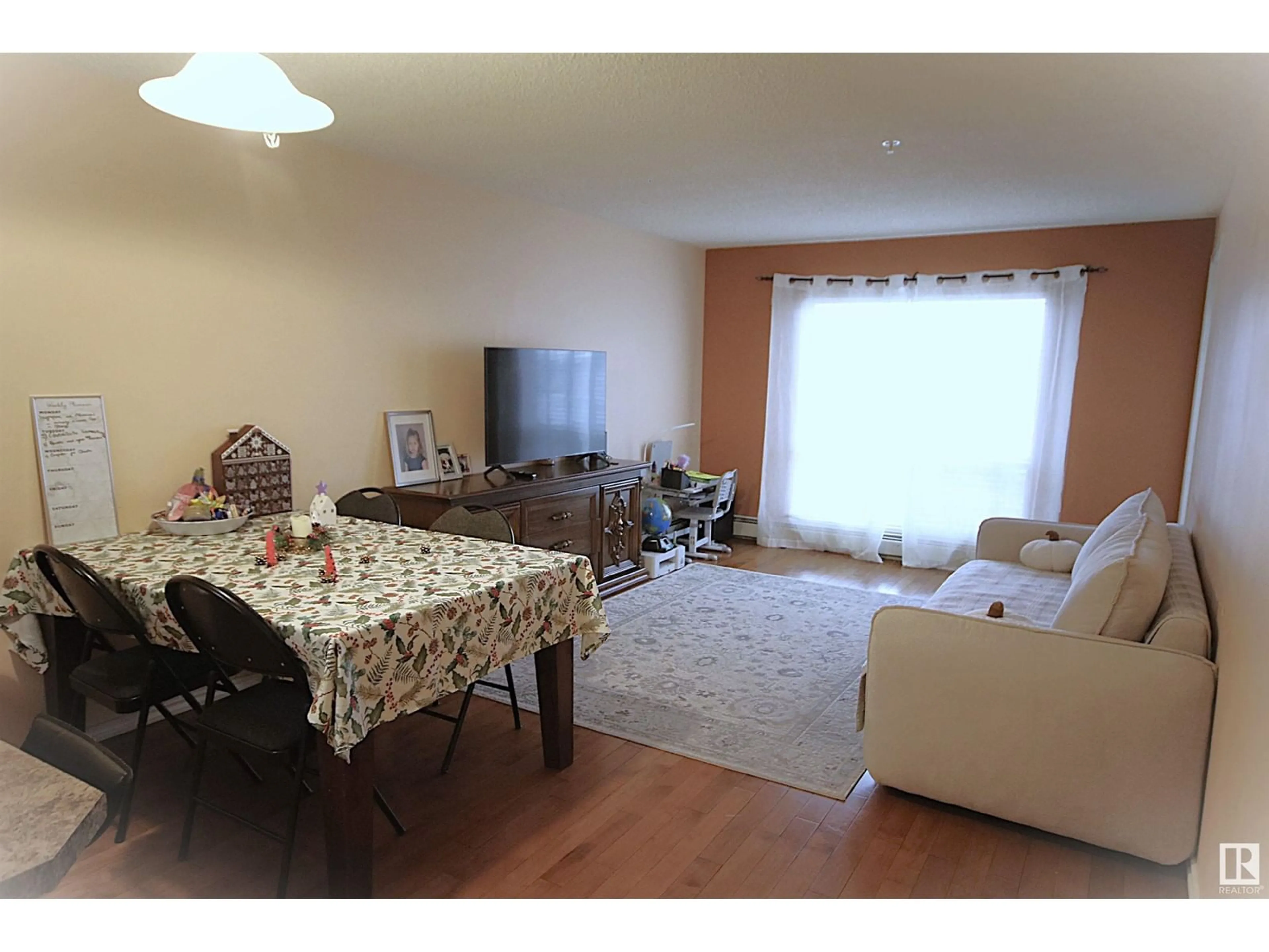 Living room, wood floors for #216 17404 64 AV NW, Edmonton Alberta T5T6X4