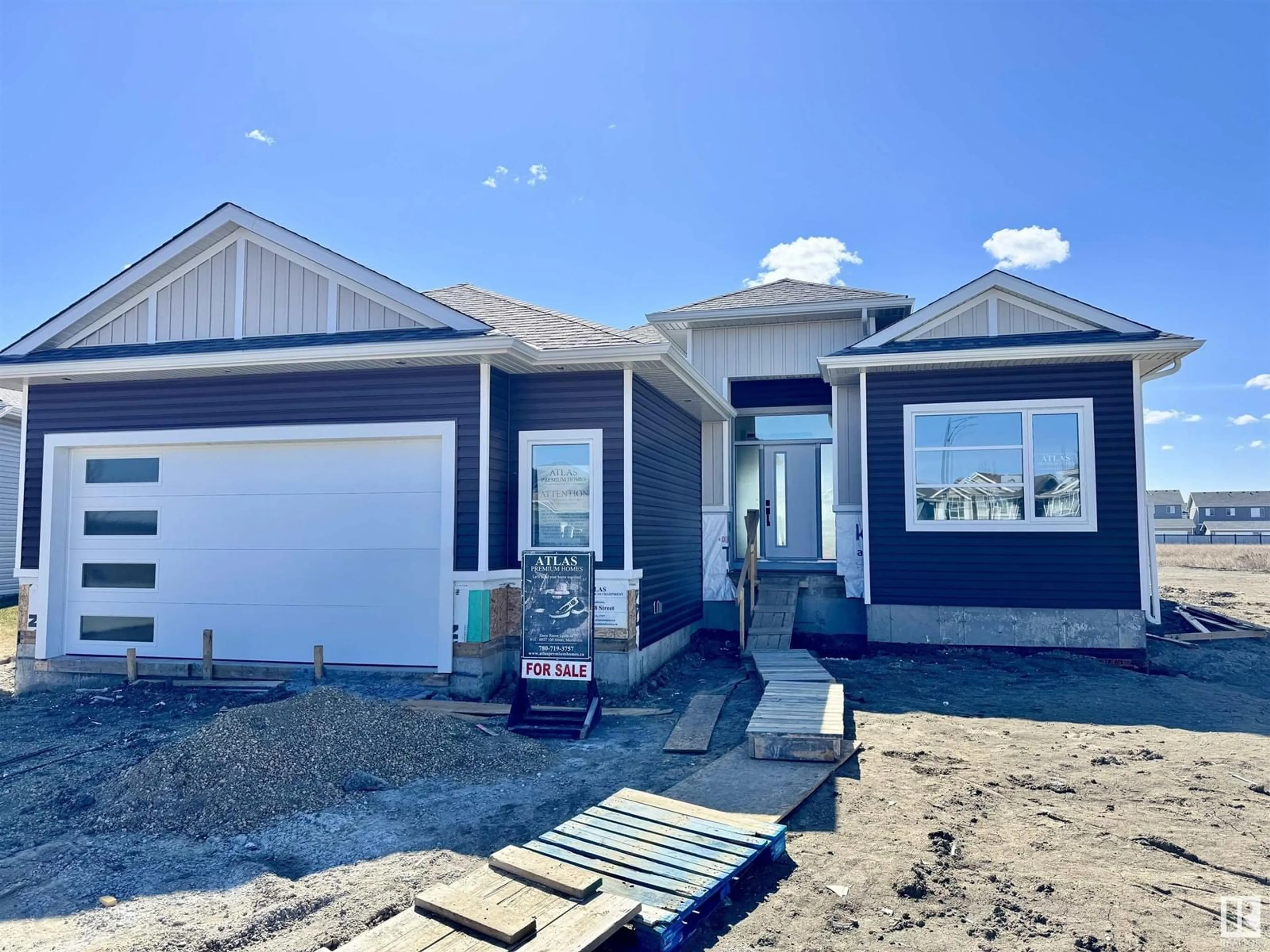 Home with vinyl exterior material, street for 9604 88 ST, Morinville Alberta T8R2N9
