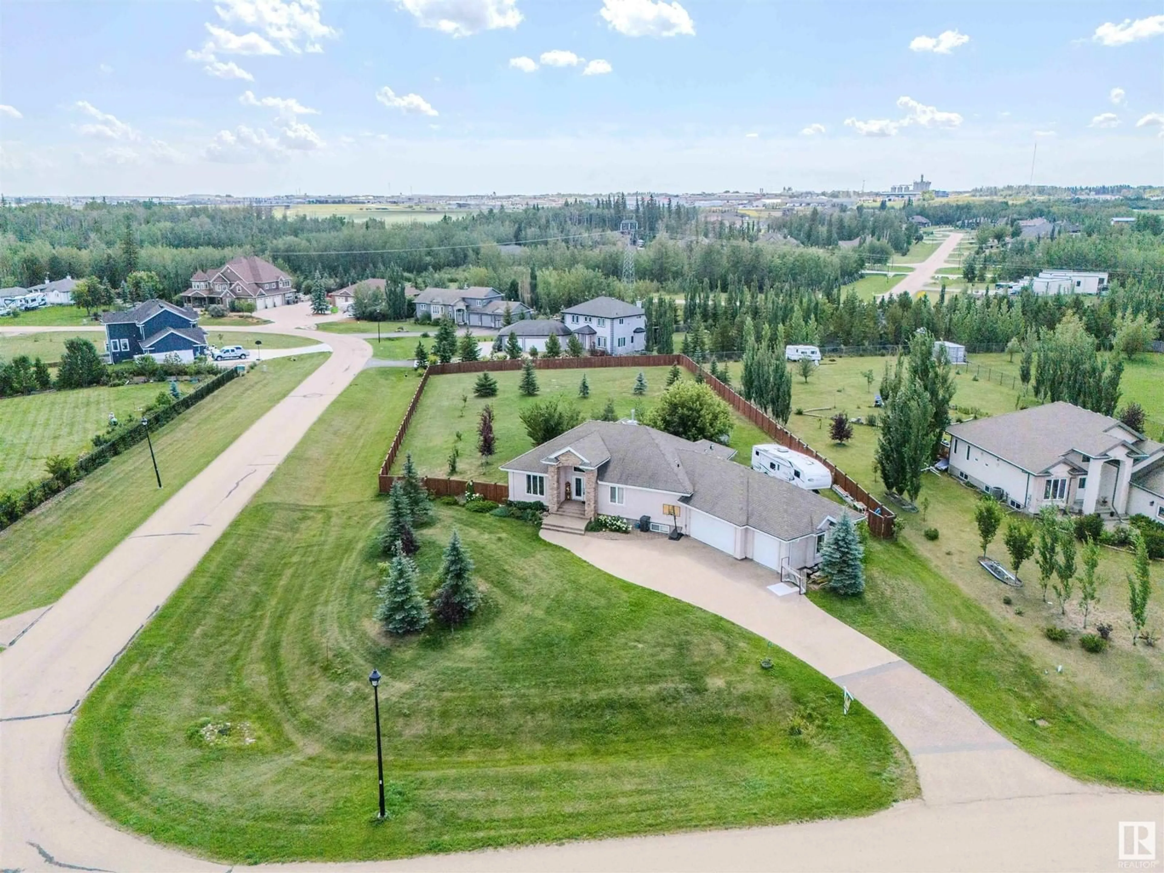 Frontside or backside of a home, the fenced backyard for 9 26328 Township Road 532A, Rural Parkland County Alberta T7X4M1