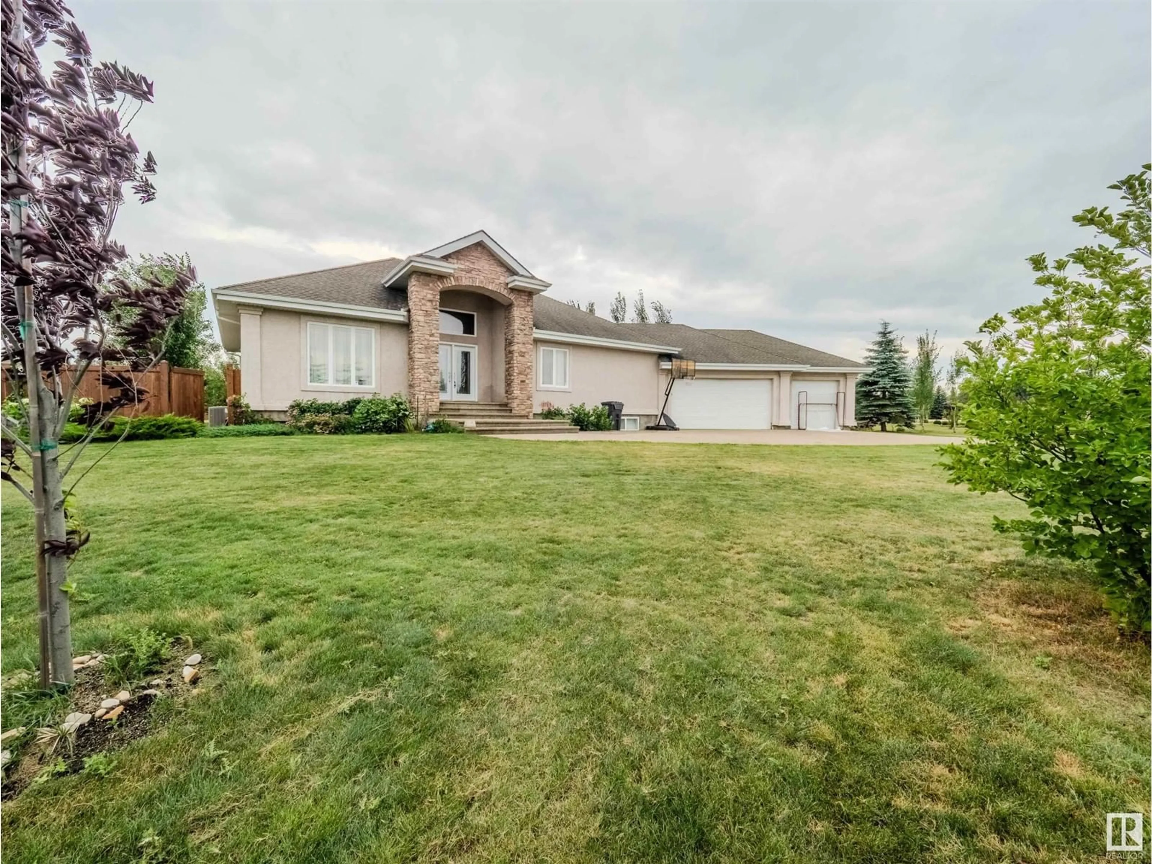 Frontside or backside of a home, the fenced backyard for 9 26328 Township Road 532A, Rural Parkland County Alberta T7X4M1