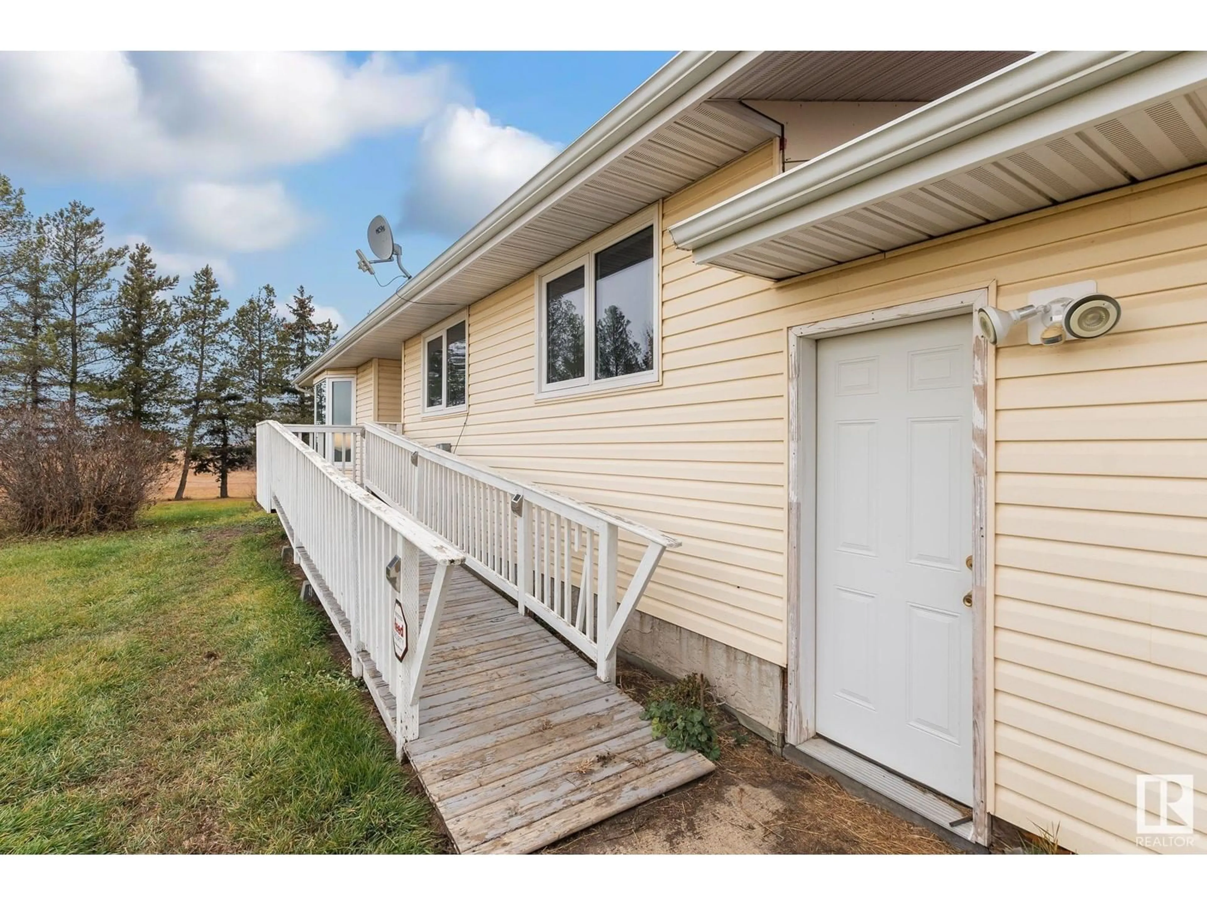 Frontside or backside of a home, the fenced backyard for 17330 TWP RD 504, Rural Beaver County Alberta T0B4A0