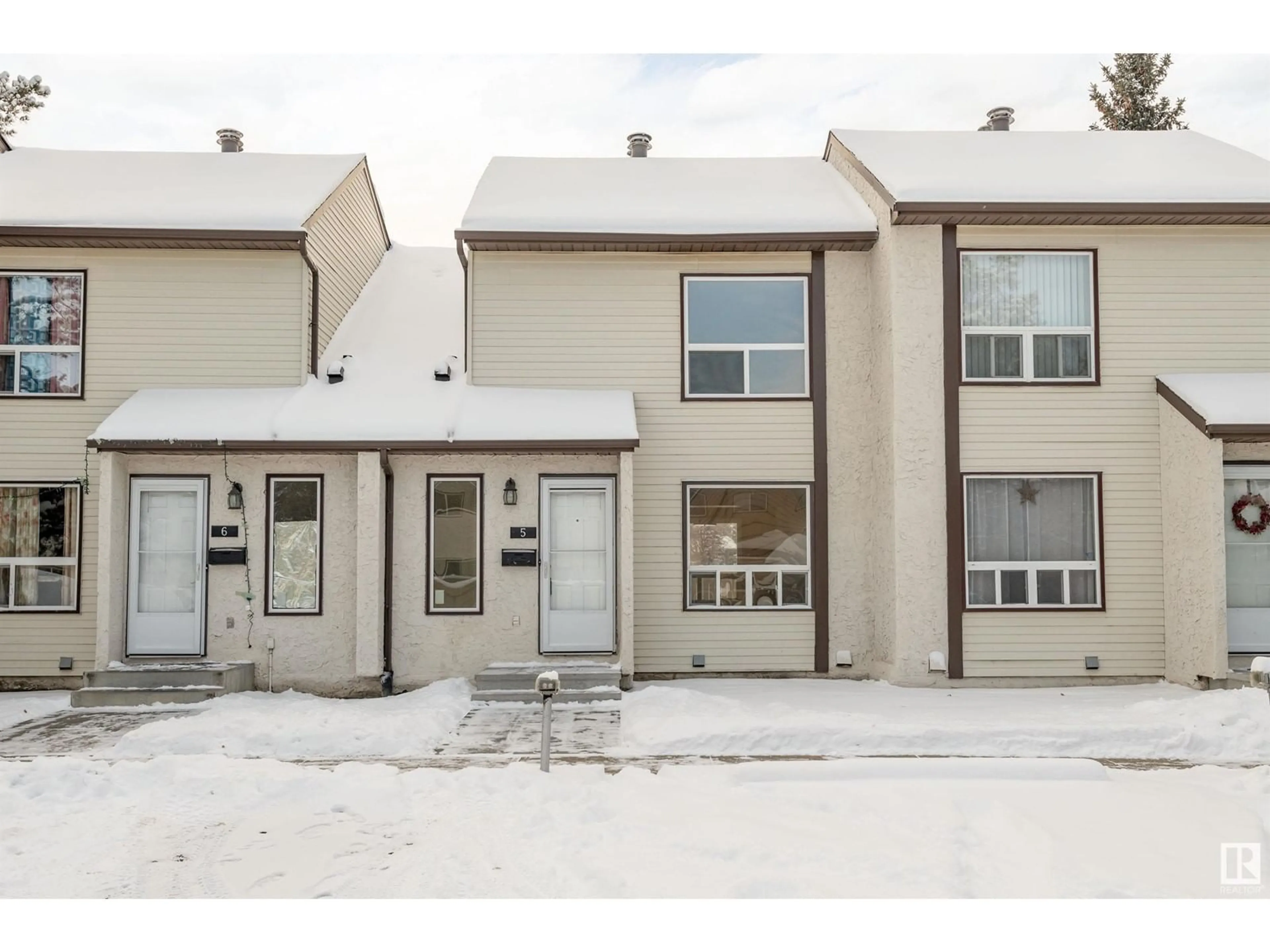 A pic from exterior of the house or condo, the front or back of building for #5 1651 46 ST NW, Edmonton Alberta T6L5A2