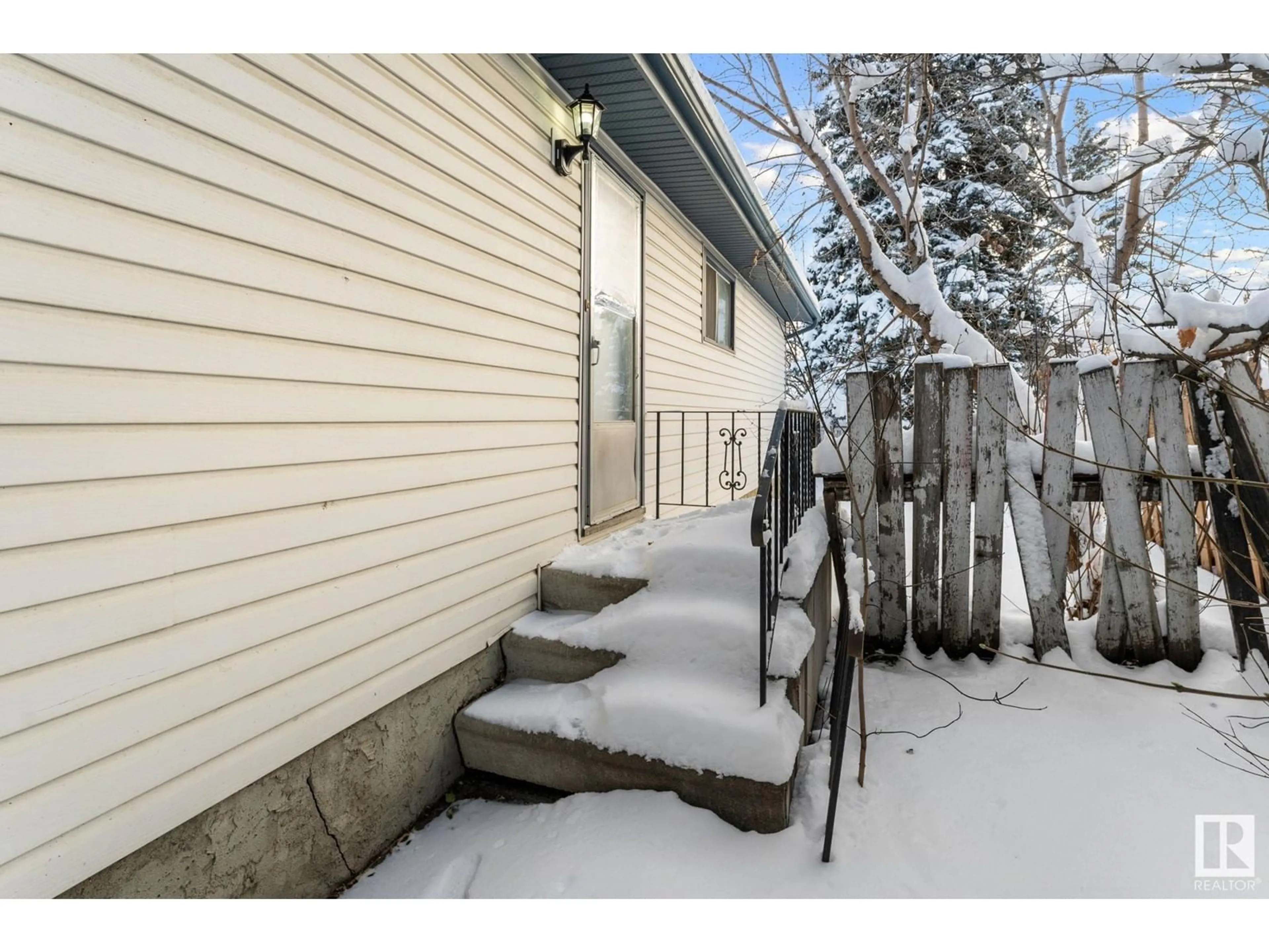 A pic from exterior of the house or condo, the fenced backyard for 28 Manor DR, Spruce Grove Alberta T7X2G8