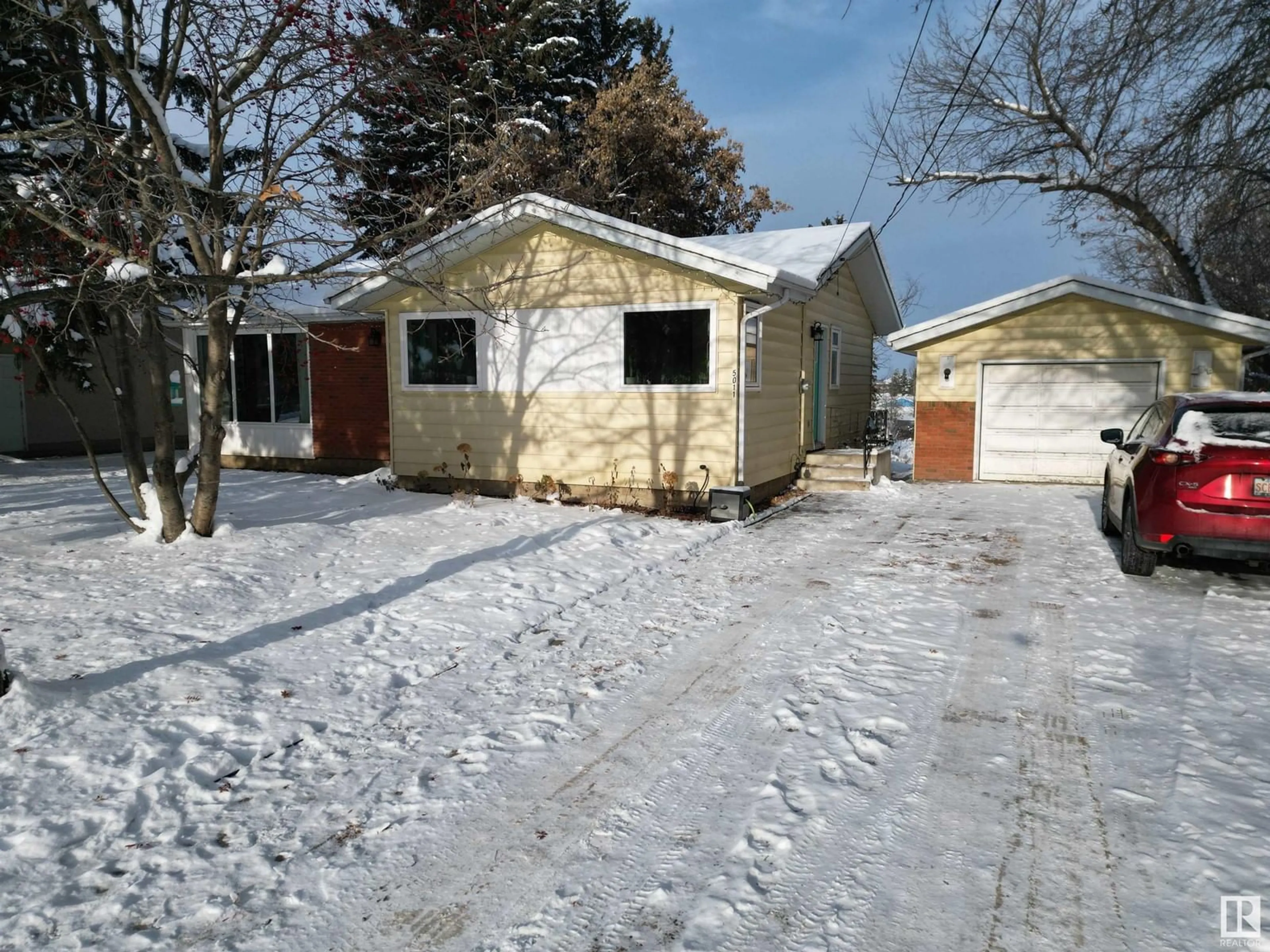 Frontside or backside of a home, cottage for 5011 47 AV, Stony Plain Alberta T7Z1L6