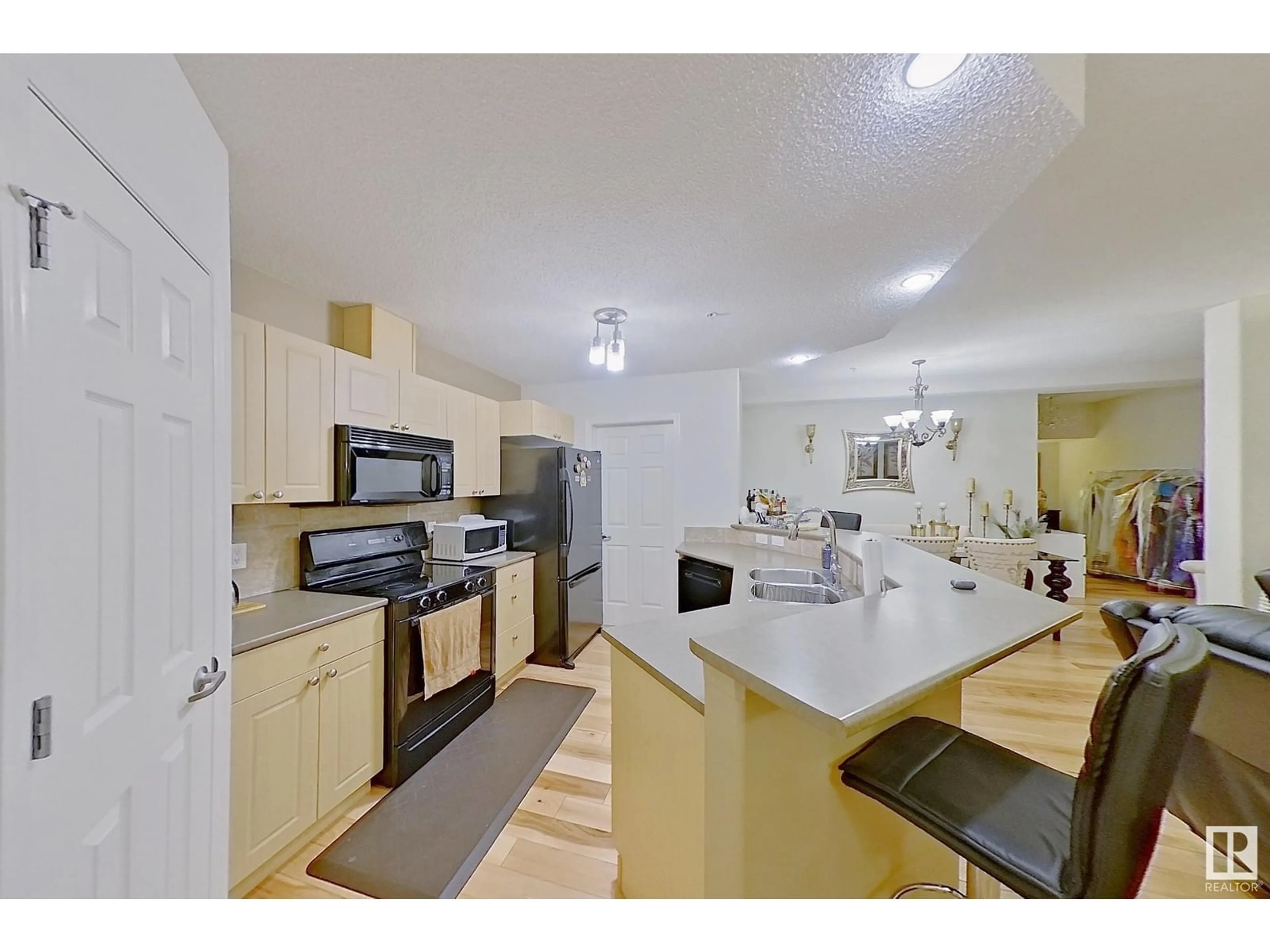 Open concept kitchen for #307 5280 TERWILLEGAR BV NW, Edmonton Alberta T6R3T9