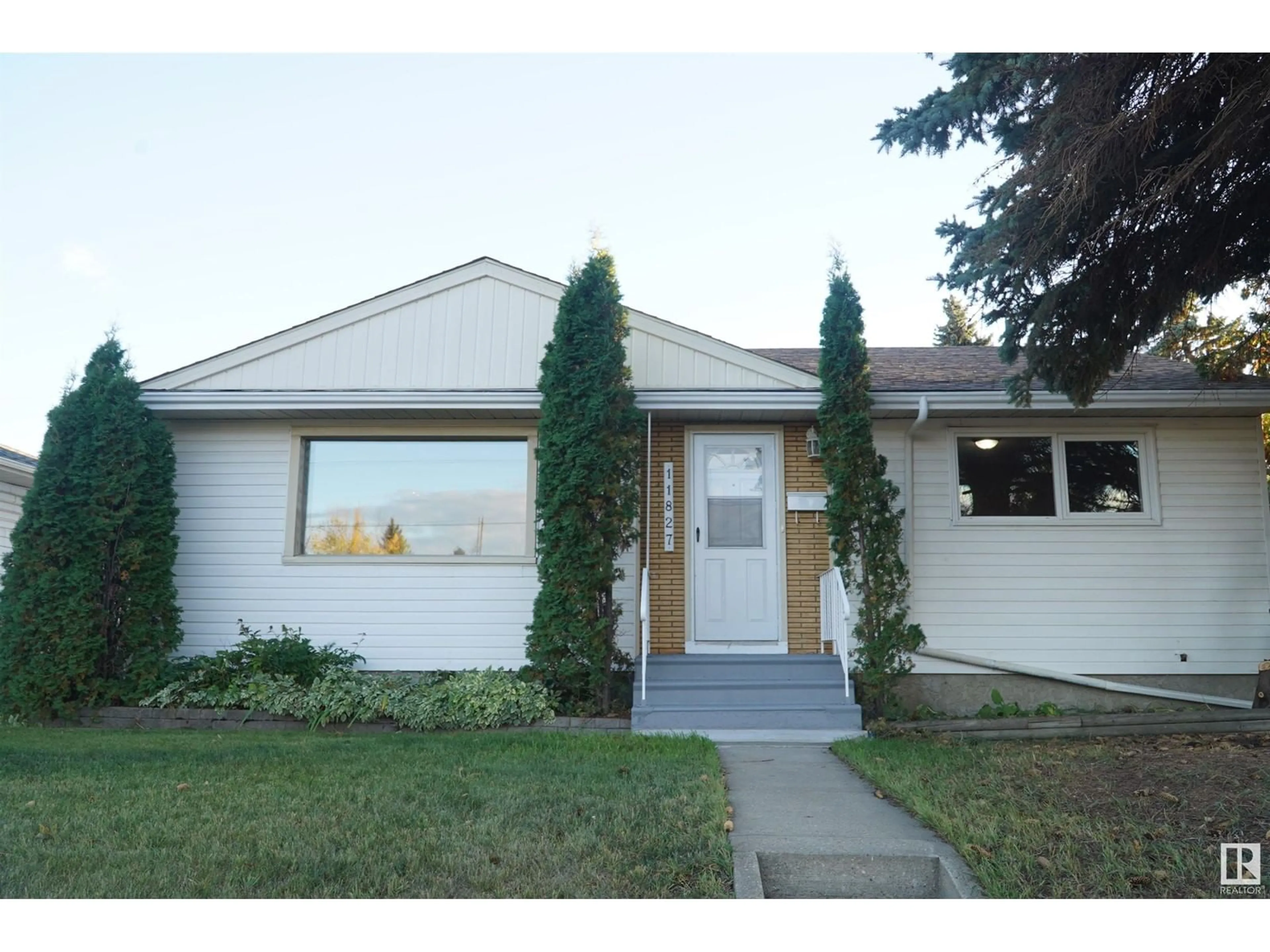 Frontside or backside of a home, cottage for 11827 132 AV NW, Edmonton Alberta T5E1A8