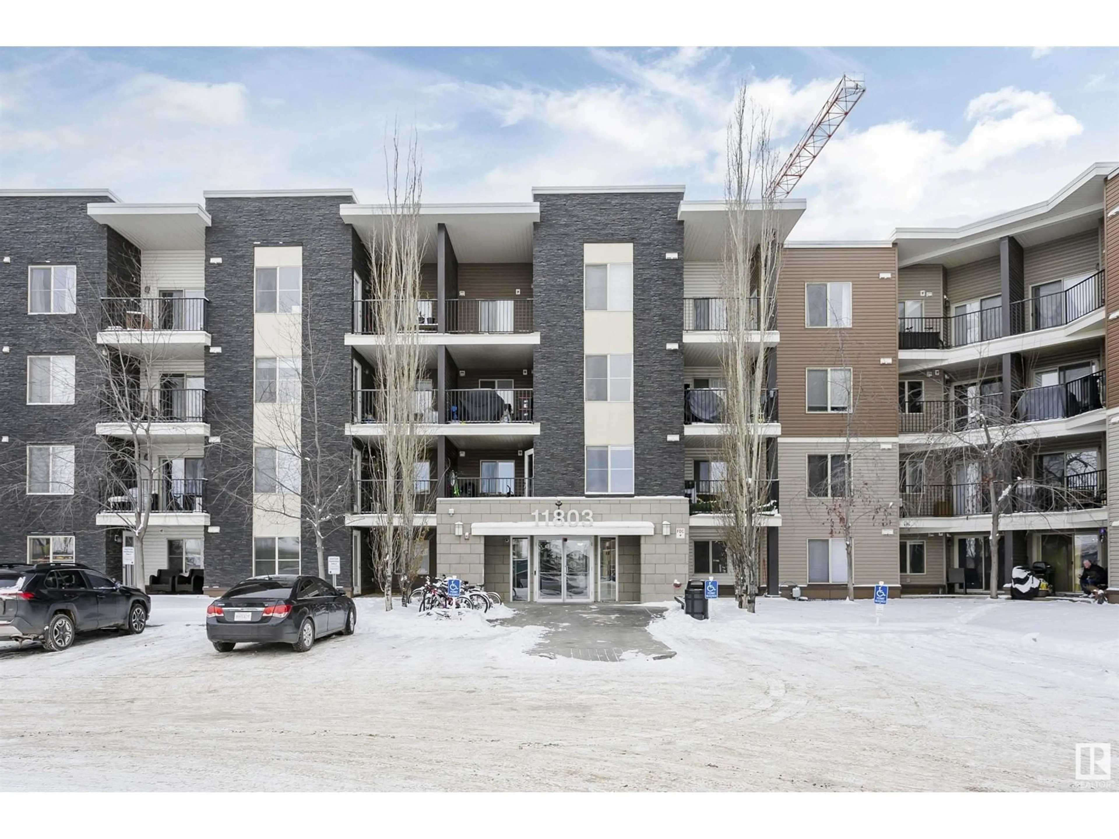 A pic from exterior of the house or condo, the front or back of building for #111 11803 22 AV SW, Edmonton Alberta T6W2R9