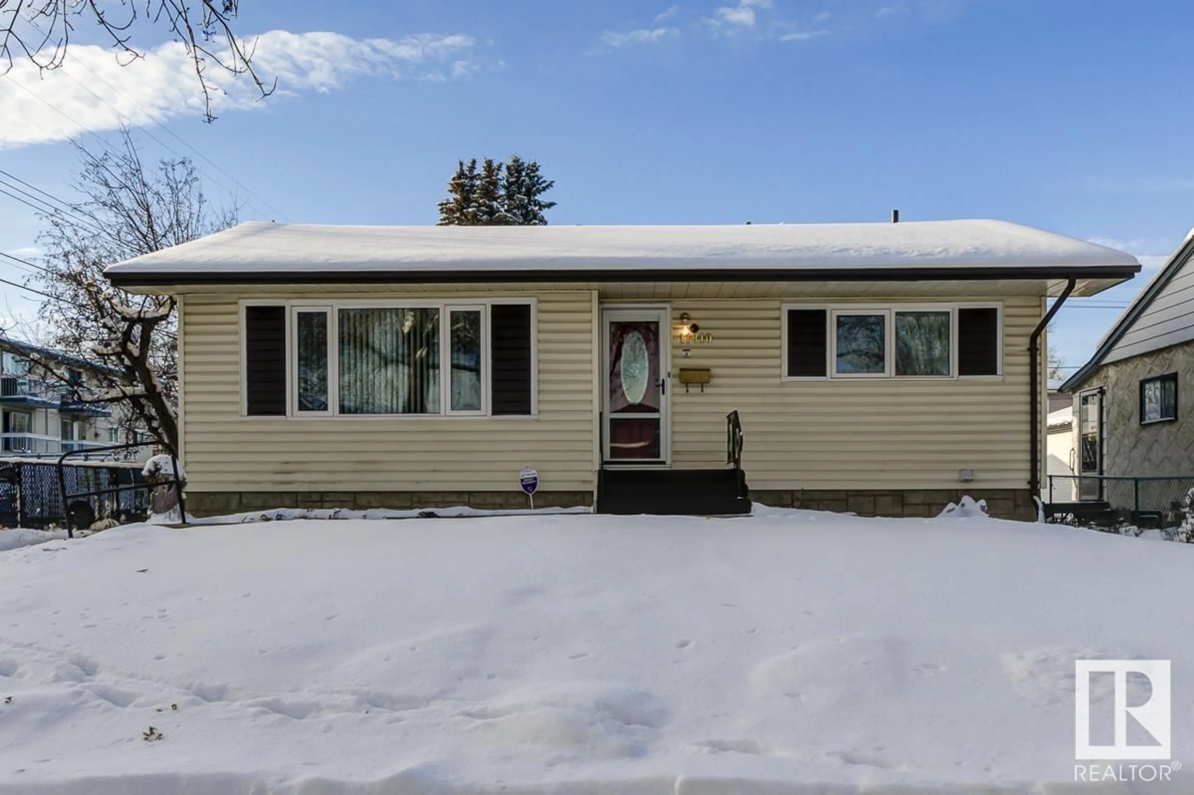 Home with vinyl exterior material for 11810 37 ST NW, Edmonton Alberta T5W2B8