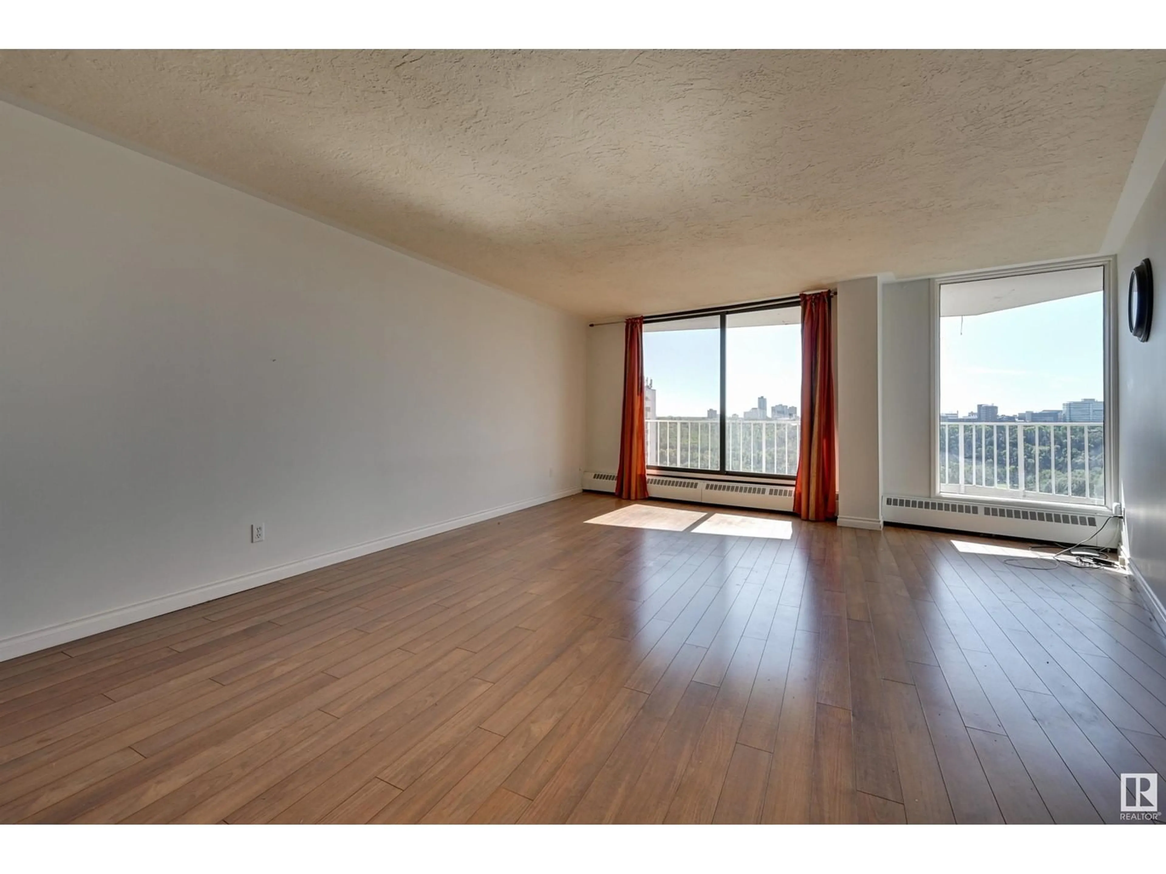 A pic of a room, wood floors for #1203 10045 117 ST NW, Edmonton Alberta T5K1W8