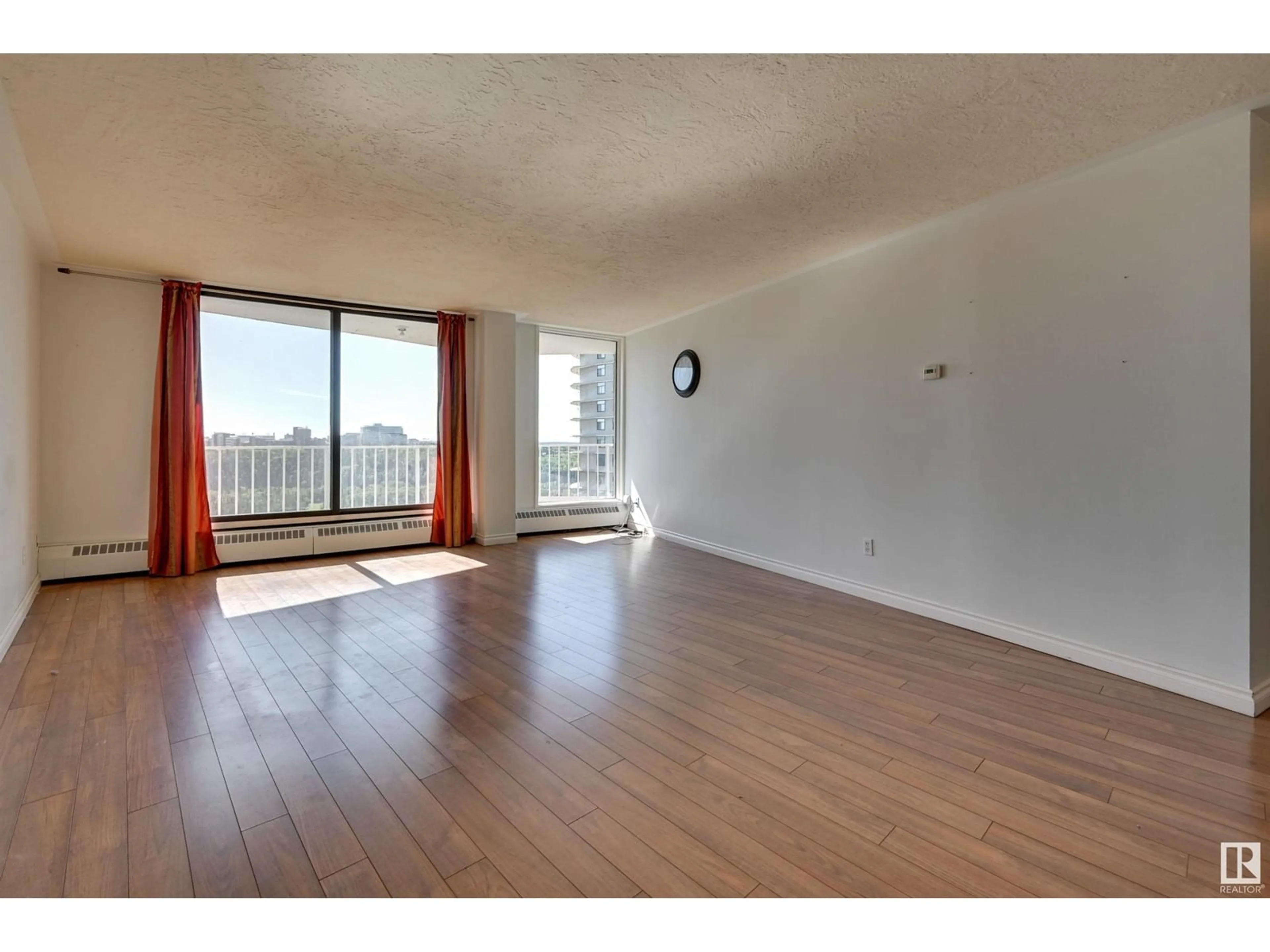 A pic of a room, wood floors for #1203 10045 117 ST NW, Edmonton Alberta T5K1W8