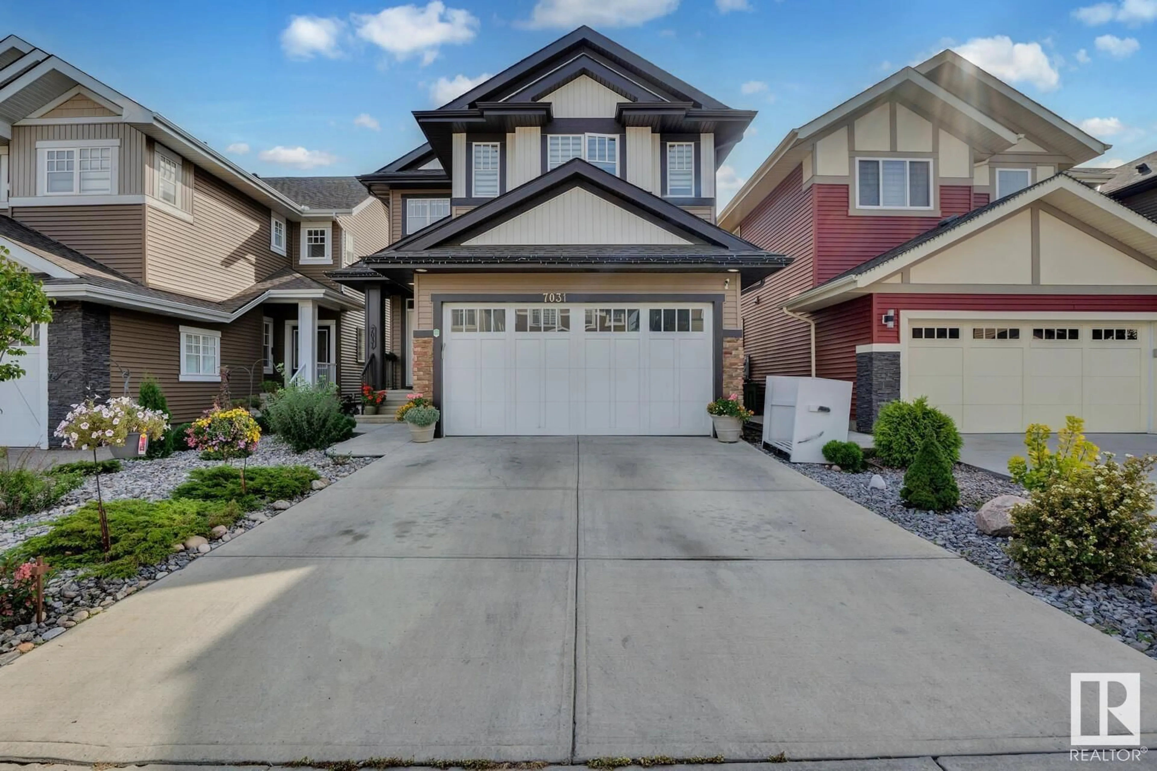 Frontside or backside of a home, the street view for 7031 173 AV NW, Edmonton Alberta T5Z0M9