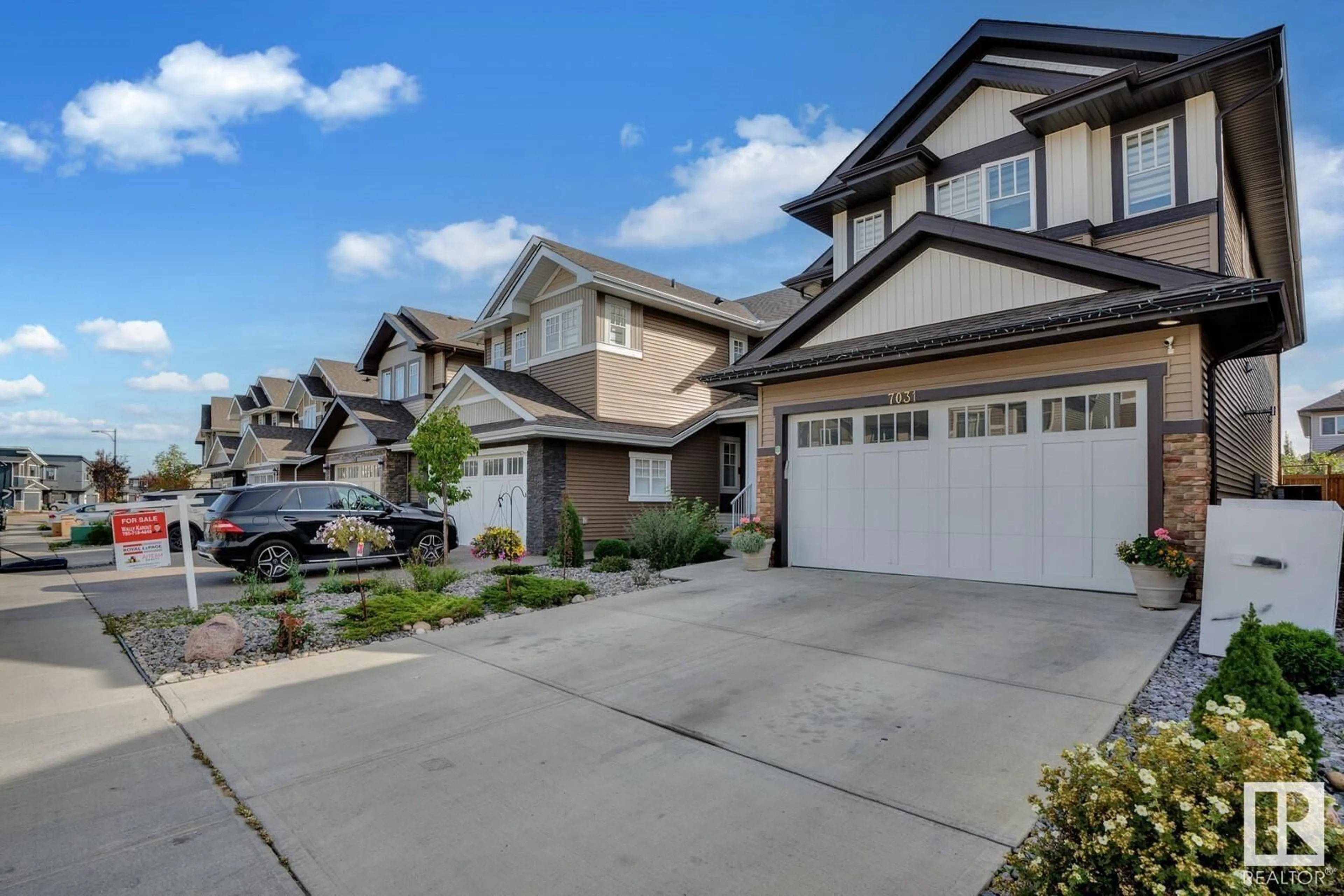 Frontside or backside of a home, the street view for 7031 173 AV NW, Edmonton Alberta T5Z0M9