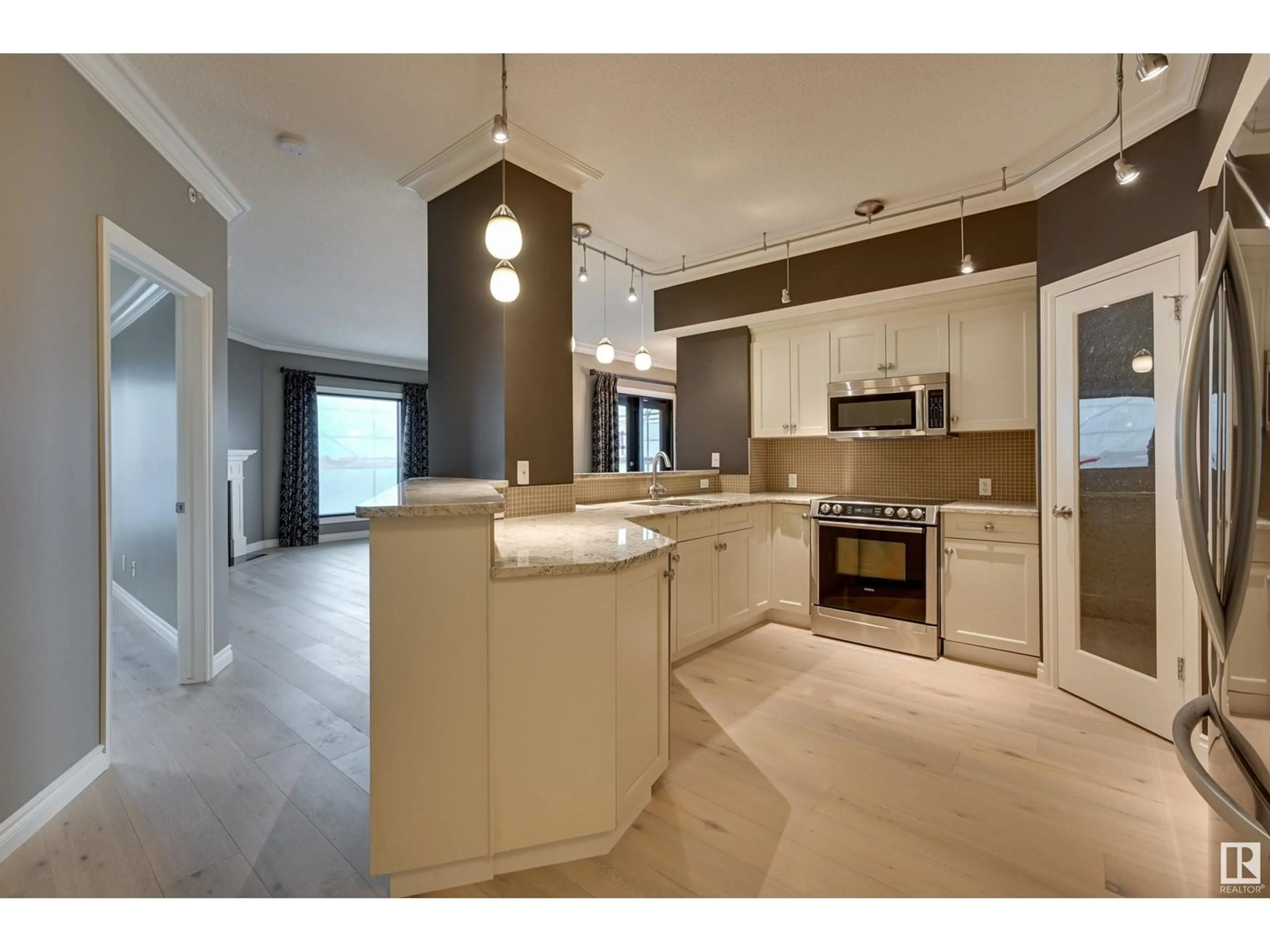 Open concept kitchen for #408 10108 125 ST NW, Edmonton Alberta T5N4B6