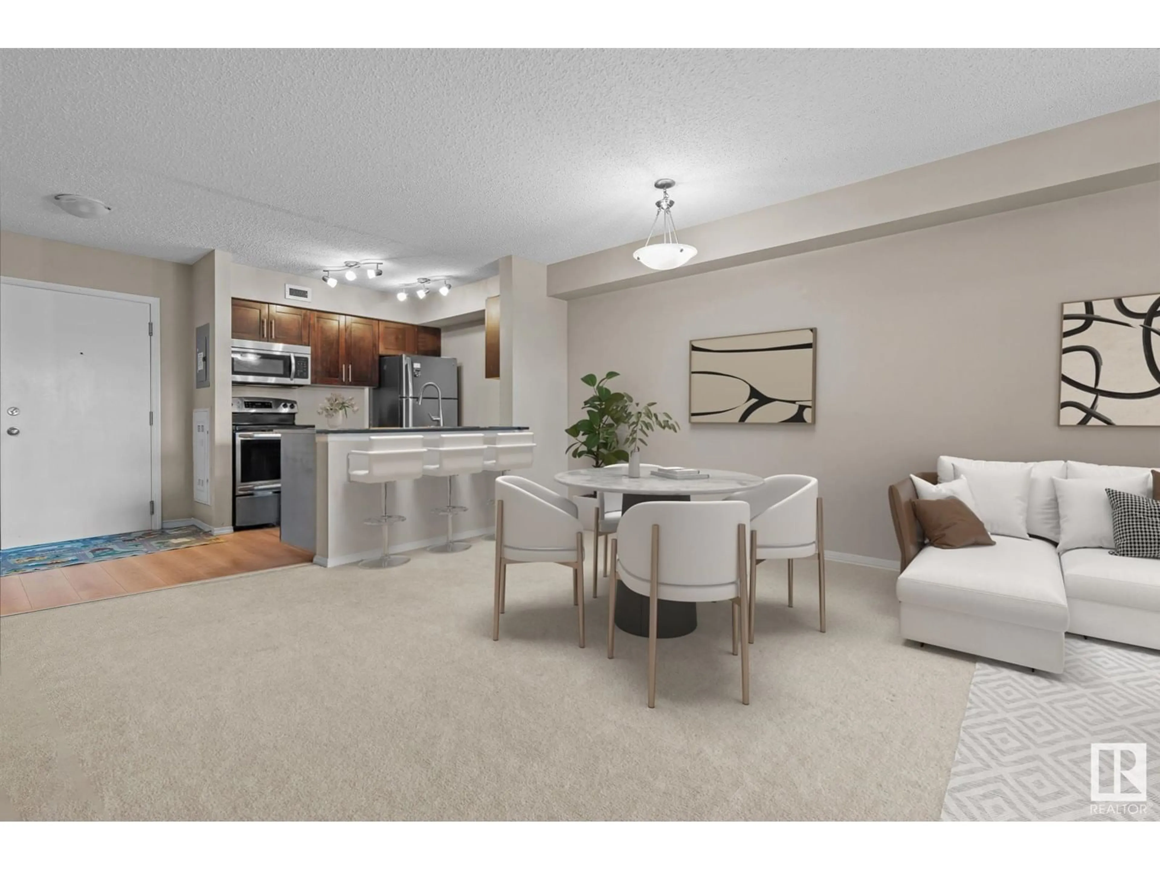 Open concept kitchen for #403 12035 22 AV SW, Edmonton Alberta T6W2X9