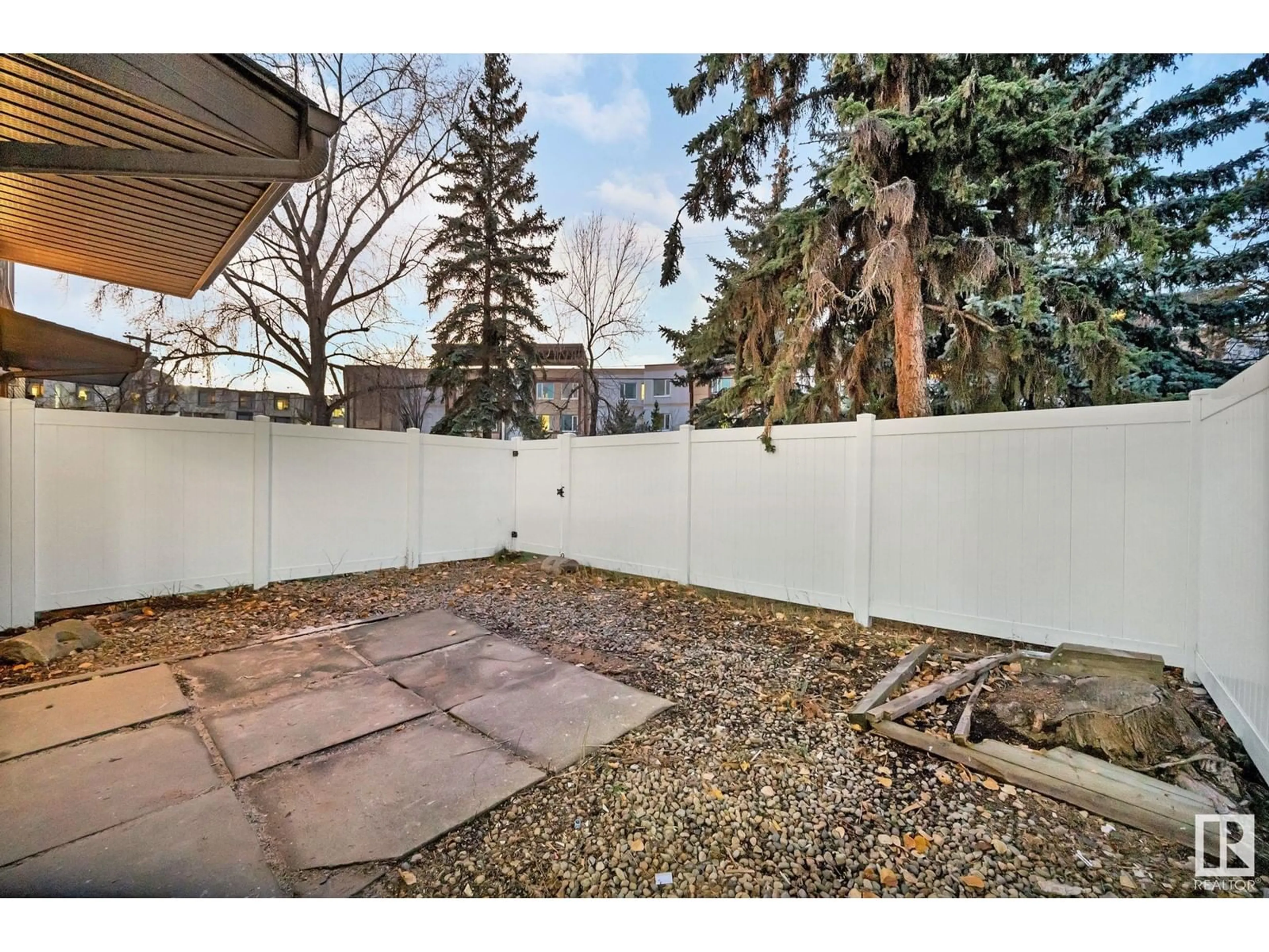 Patio, the fenced backyard for 21E MEADOWLARK VG NW, Edmonton Alberta T5R5X3