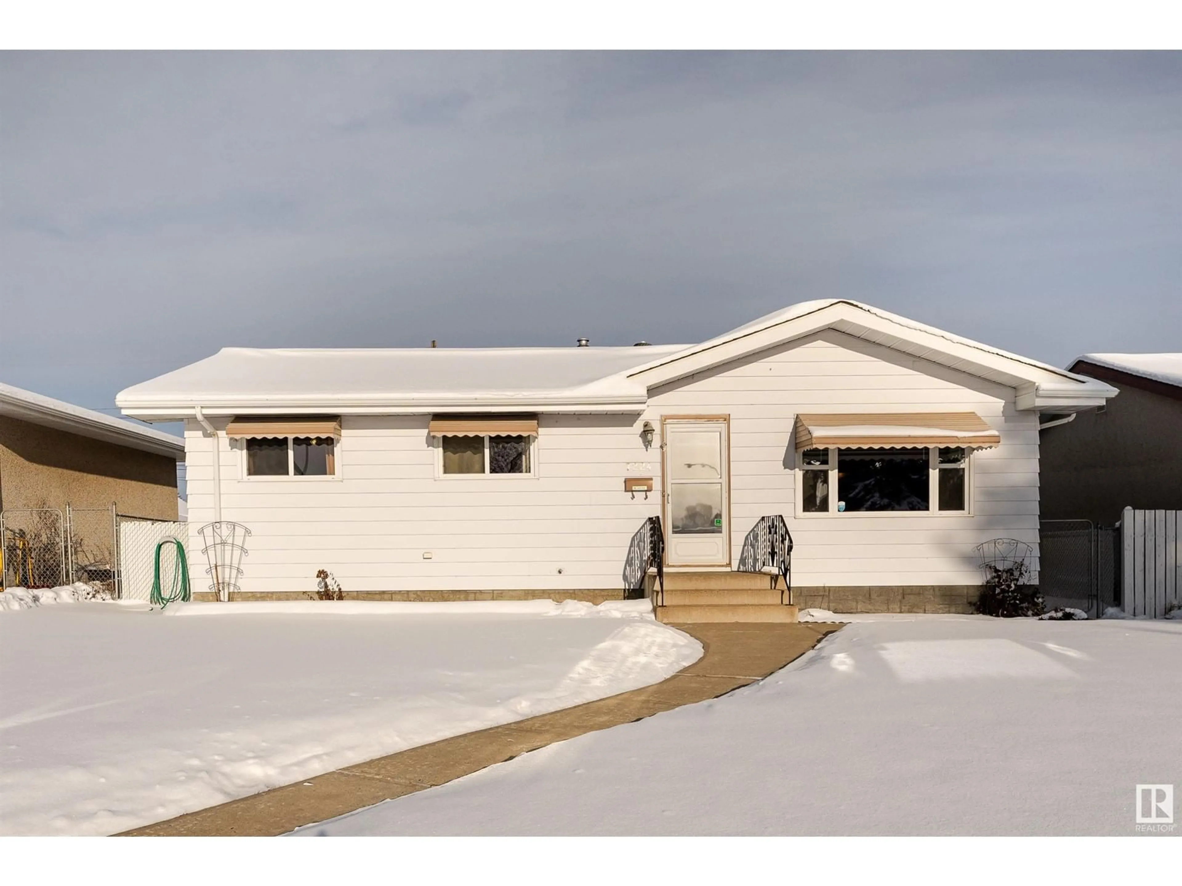 Frontside or backside of a home, the front or back of building for 7224 DELWOOD RD NW, Edmonton Alberta T5C3A7