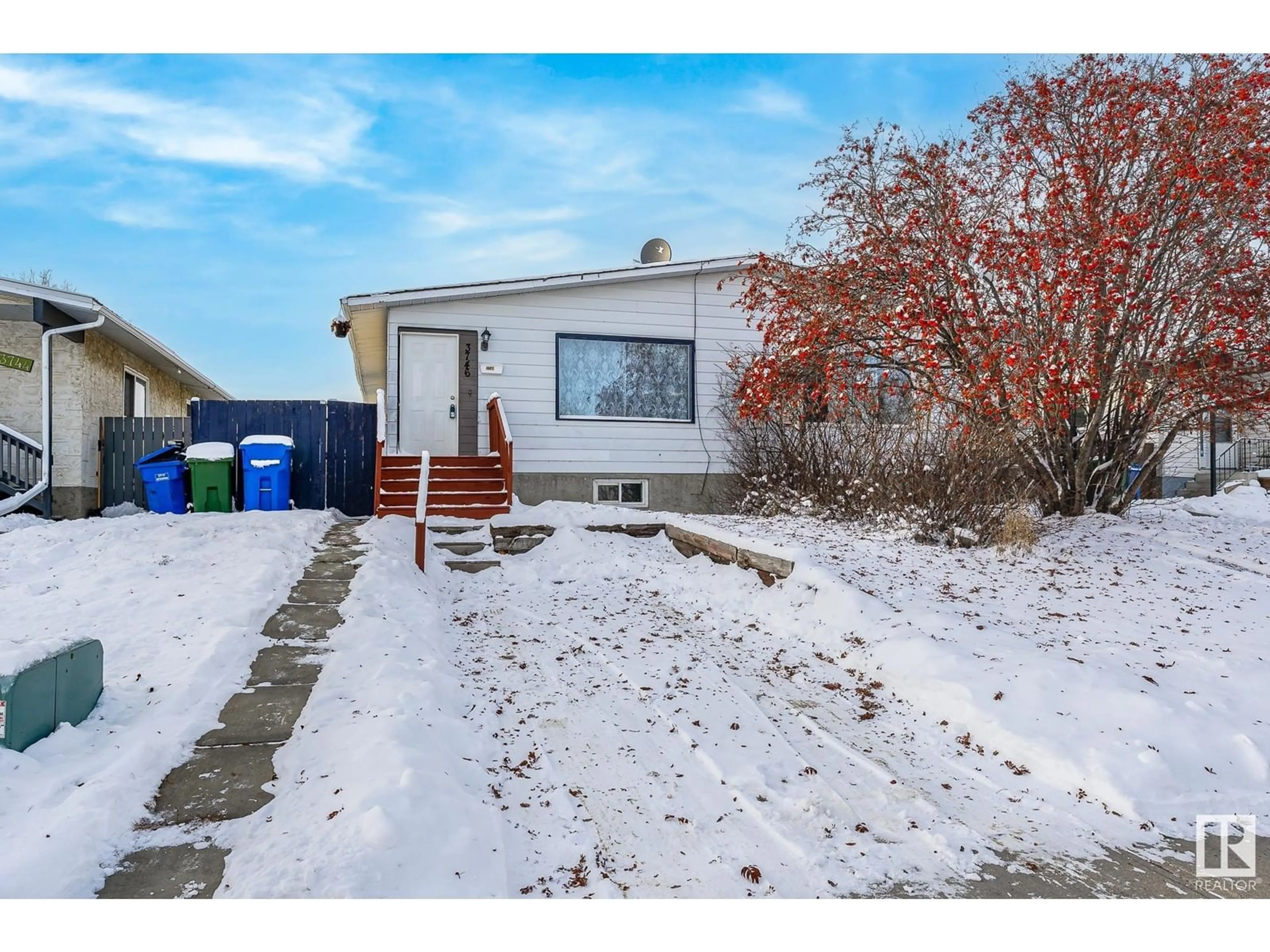 A pic from exterior of the house or condo, the fenced backyard for 3746 54 ST, Wetaskiwin Alberta T9A1X2