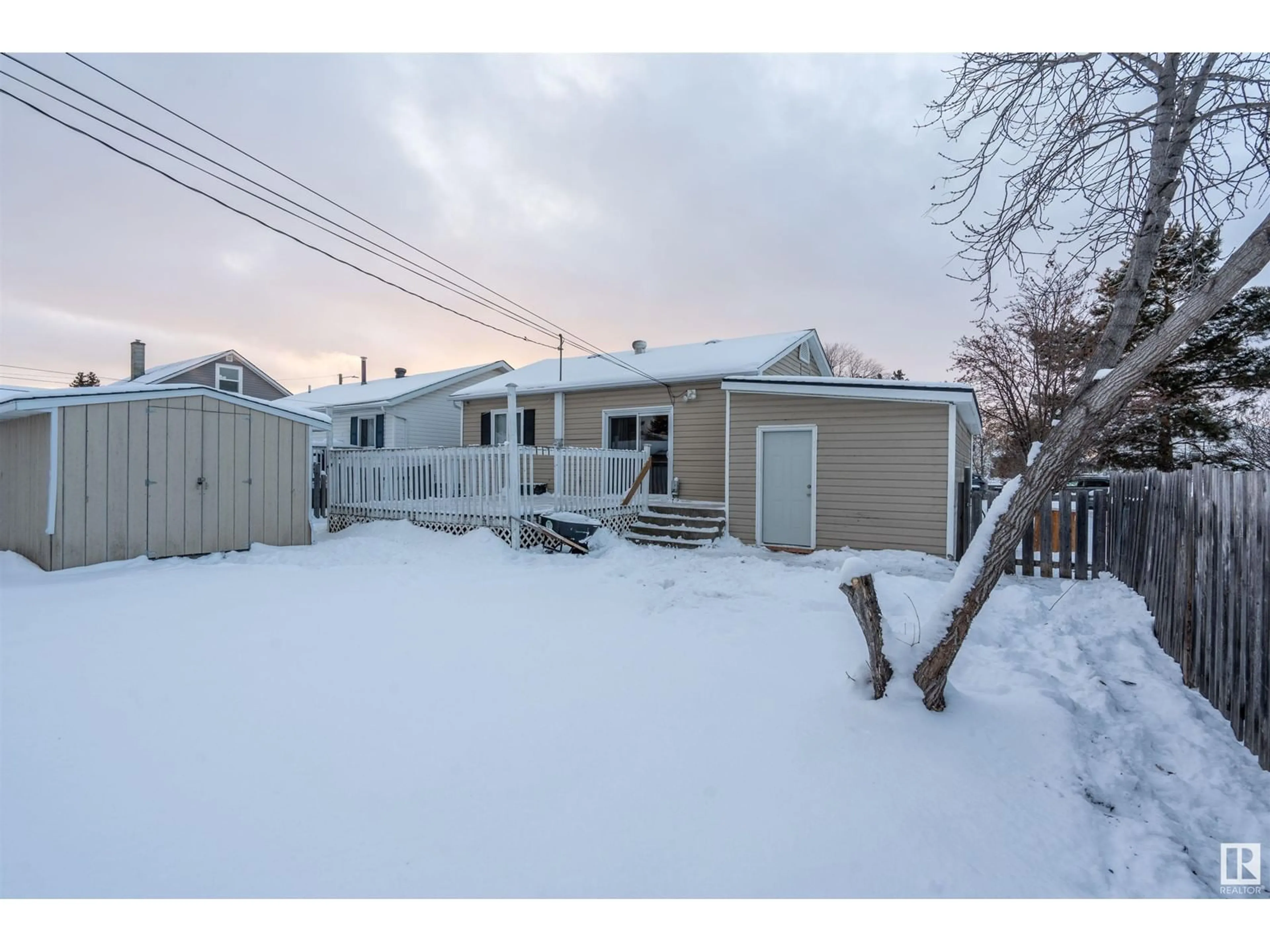 A pic from exterior of the house or condo, the fenced backyard for 4713 48 ST, Cold Lake Alberta T9M1Y4