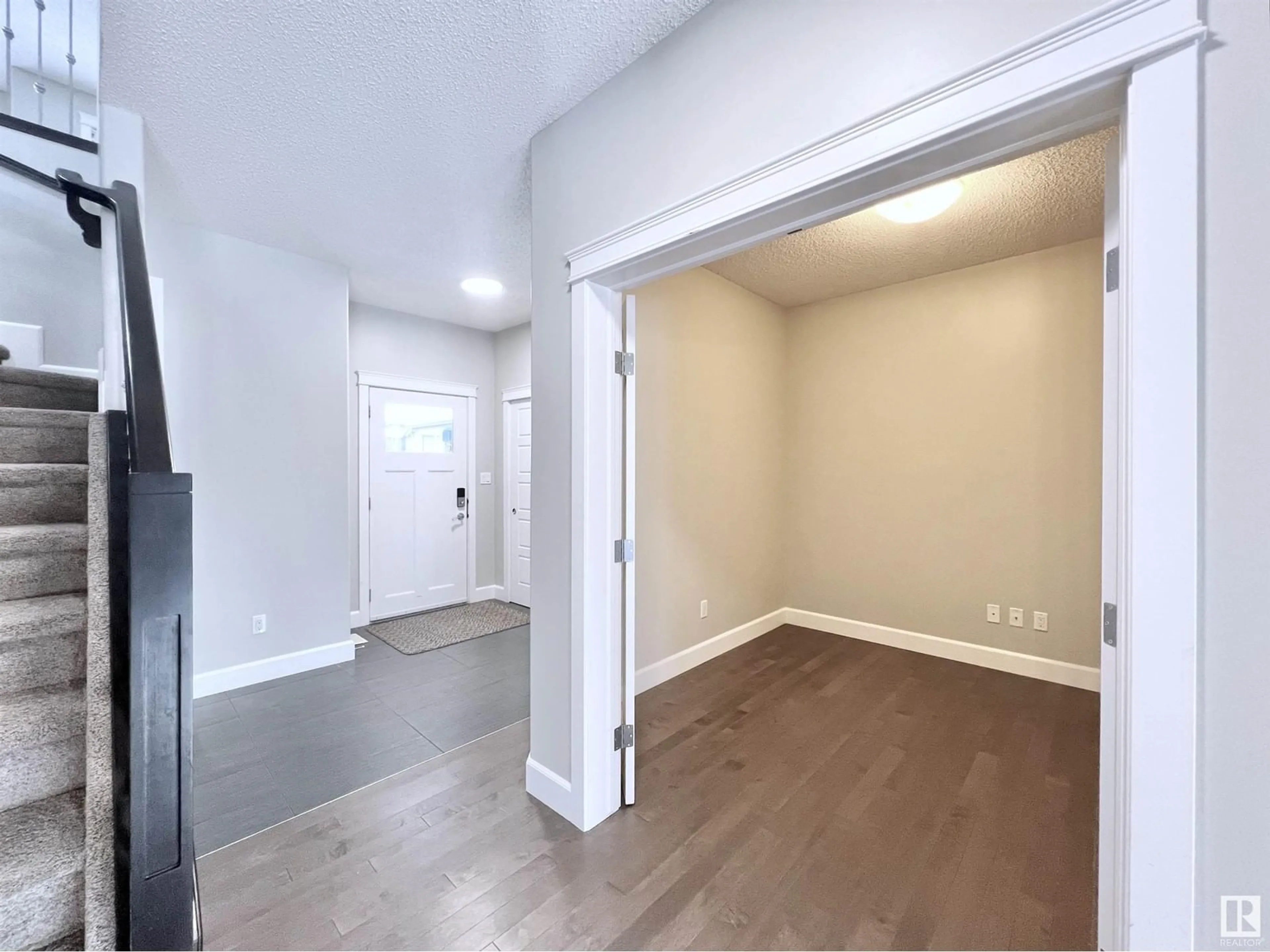 Indoor entryway, wood floors for 2087 Ware RD NW, Edmonton Alberta T6W2W3