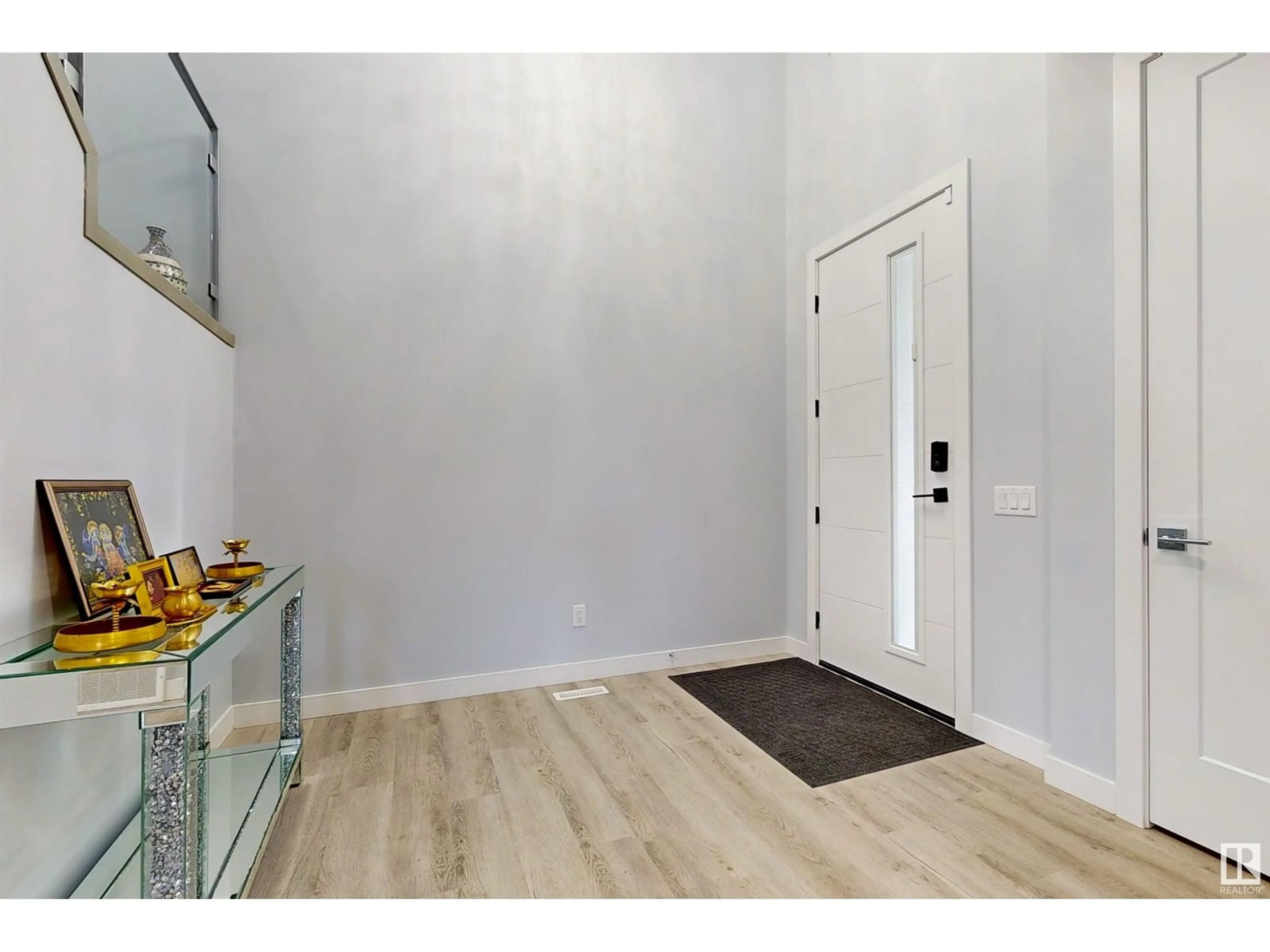 Indoor entryway, wood floors for 215 Glenridding Ravine Rd SW, Edmonton Alberta T6W5C2