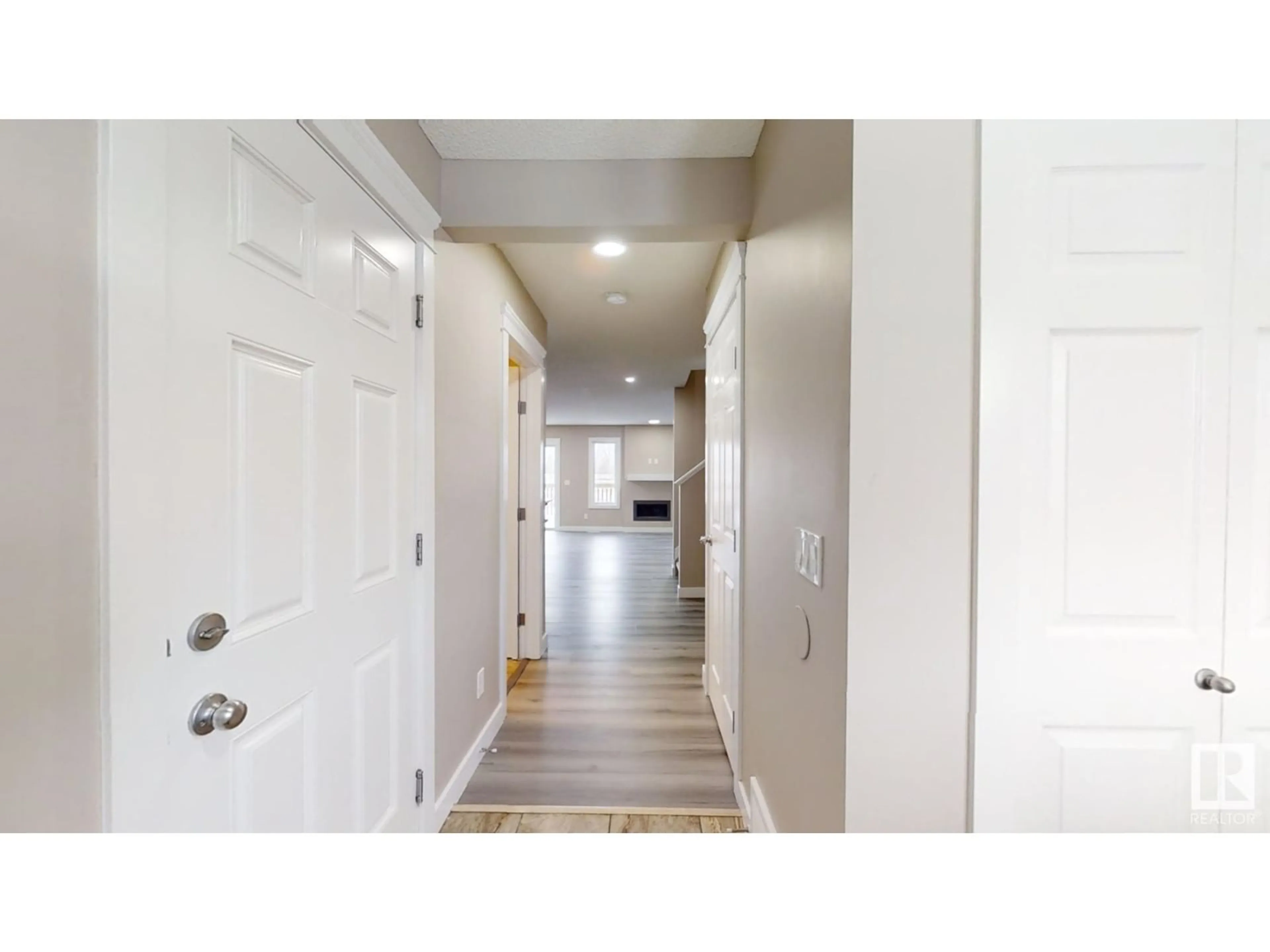 Indoor entryway, wood floors for 1208 30 Ave NW, Edmonton Alberta T6T0V7