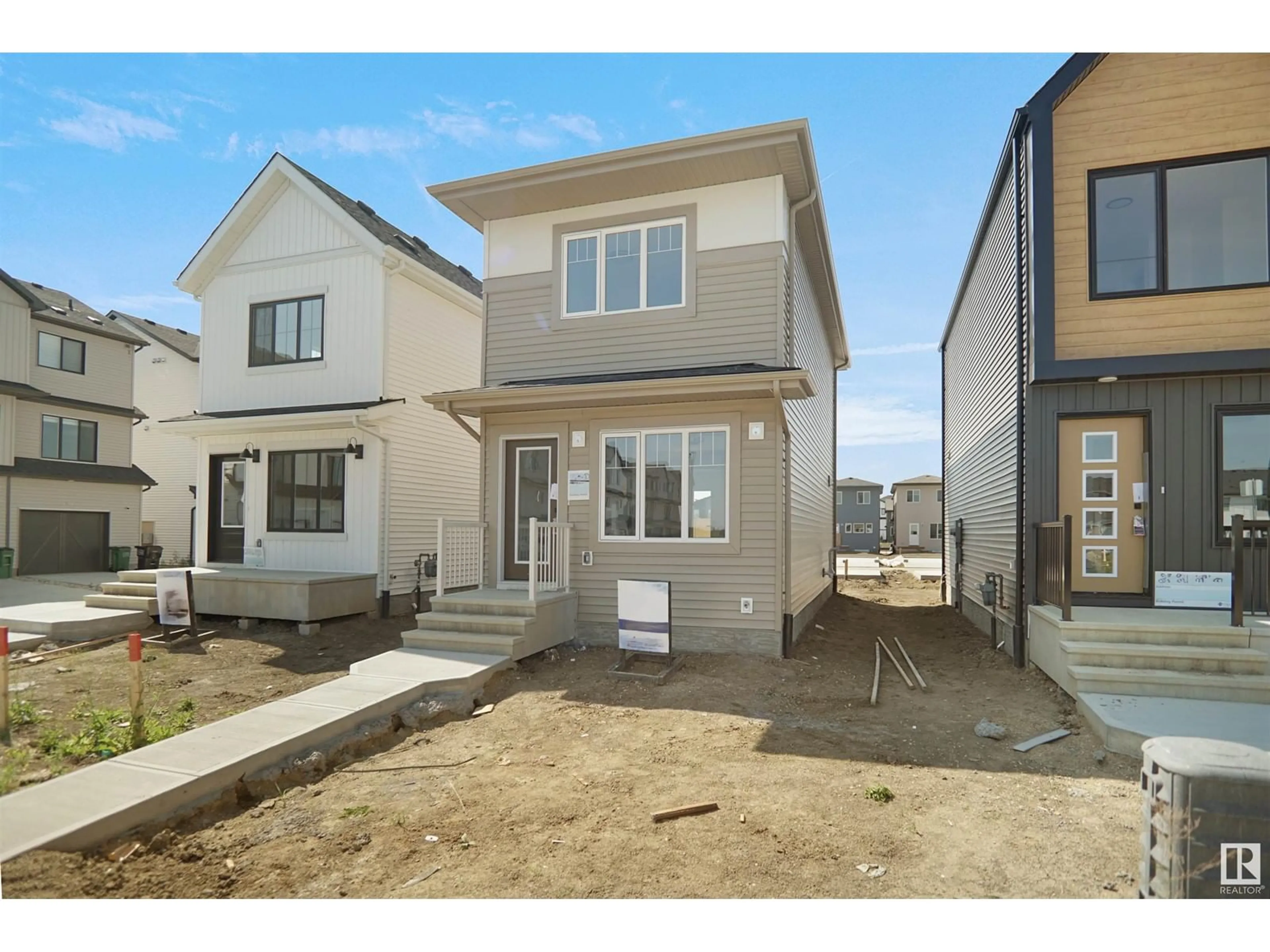 A pic from exterior of the house or condo, the fenced backyard for 2732 193 ST NW, Edmonton Alberta T6M3B2