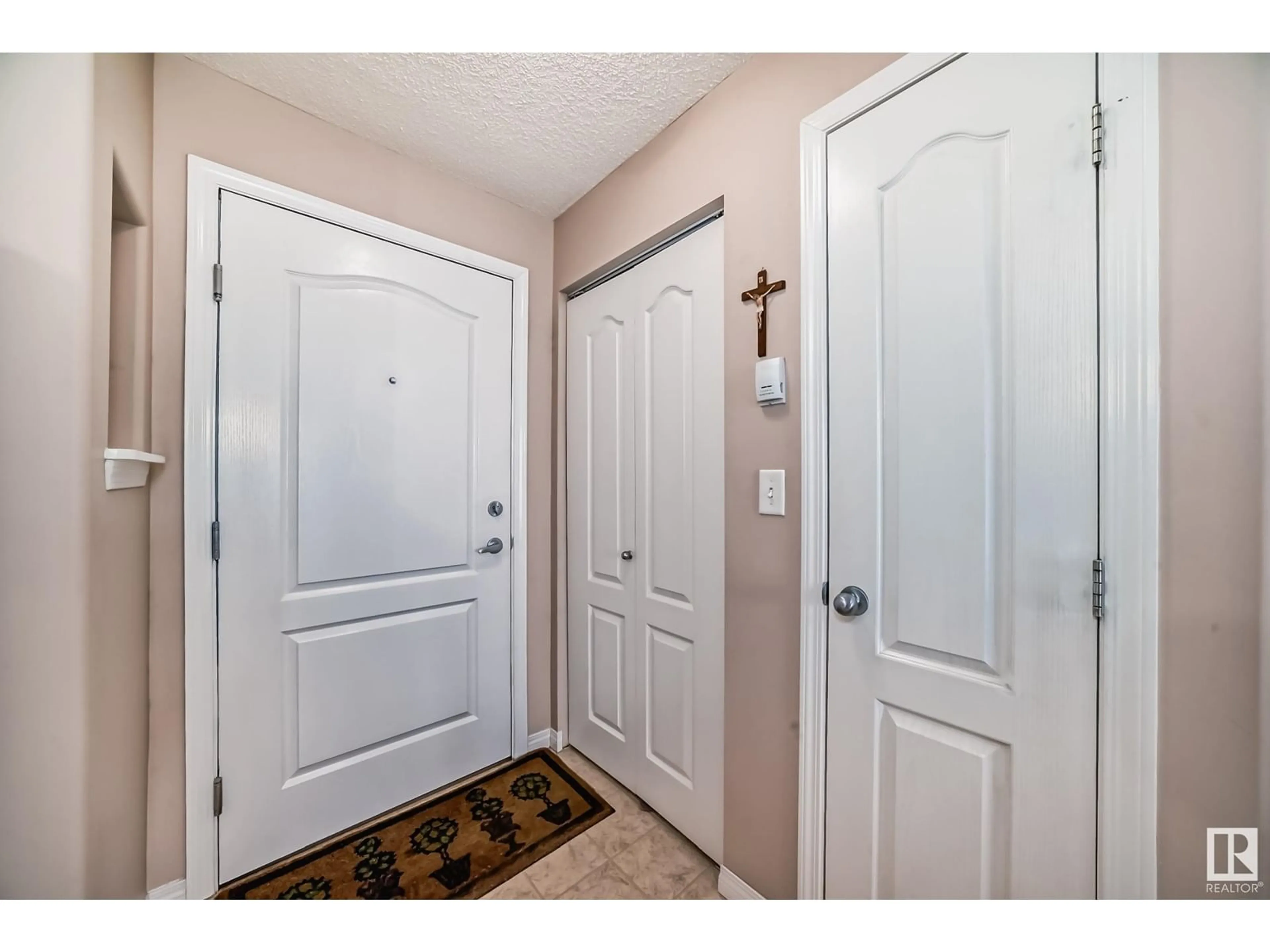 Indoor entryway, wood floors for #227 9525 162 AV NW, Edmonton Alberta T5Z3V2