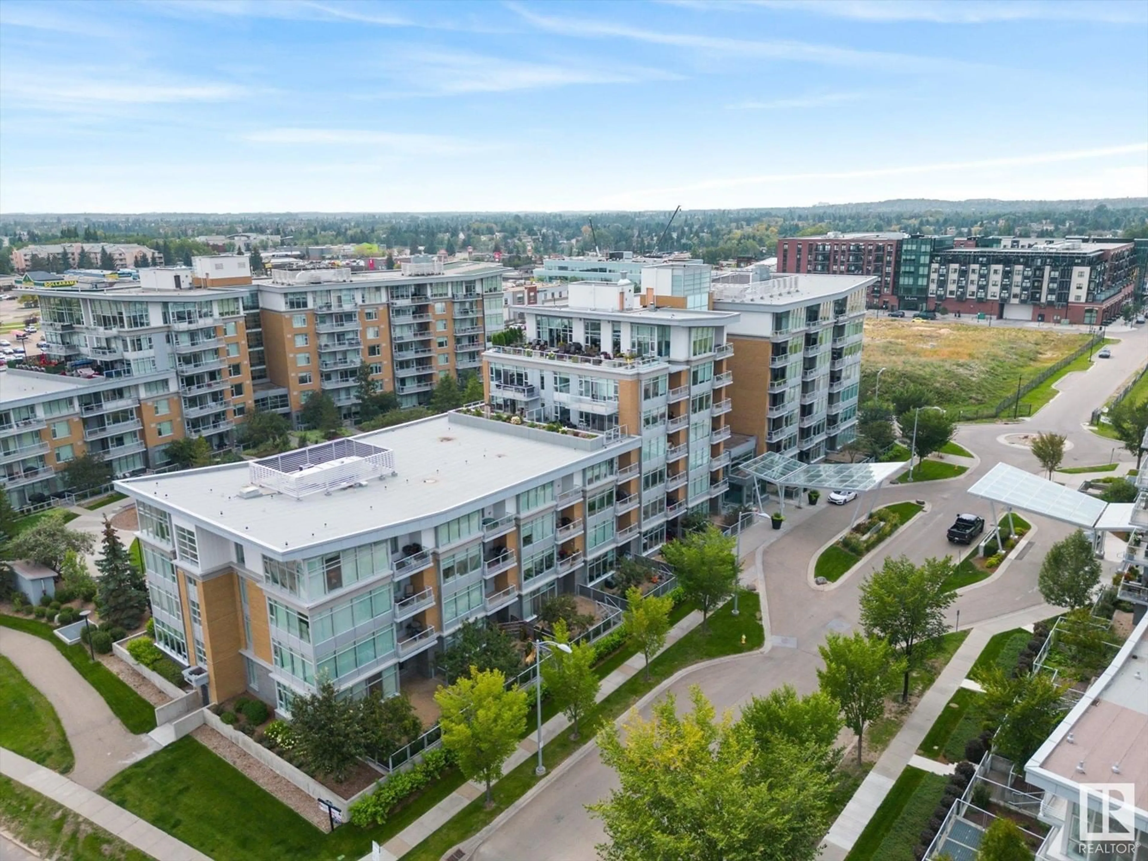 A pic from exterior of the house or condo, the view of city buildings for #211 2510 109 ST NW, Edmonton Alberta T6J2X1