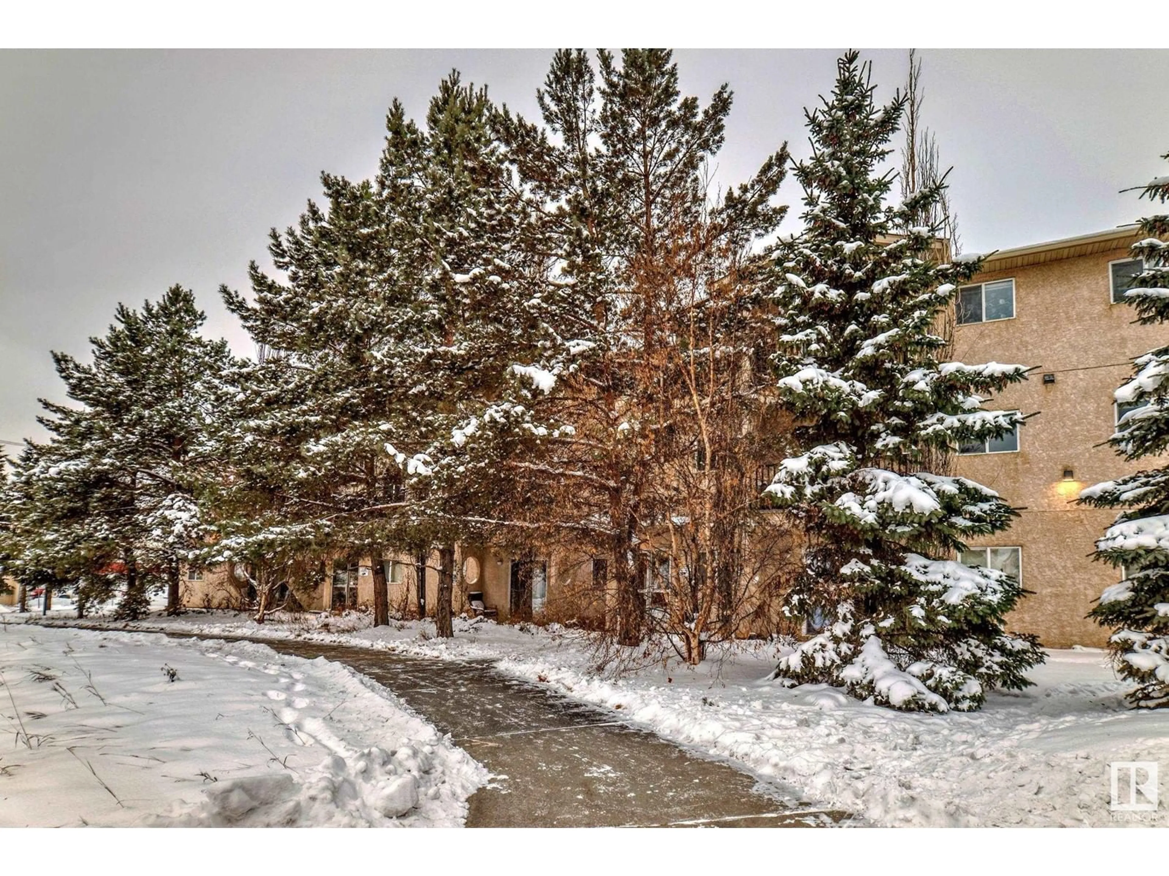 A pic from exterior of the house or condo, the street view for #303 12710 127 ST NW, Edmonton Alberta T5L1A5