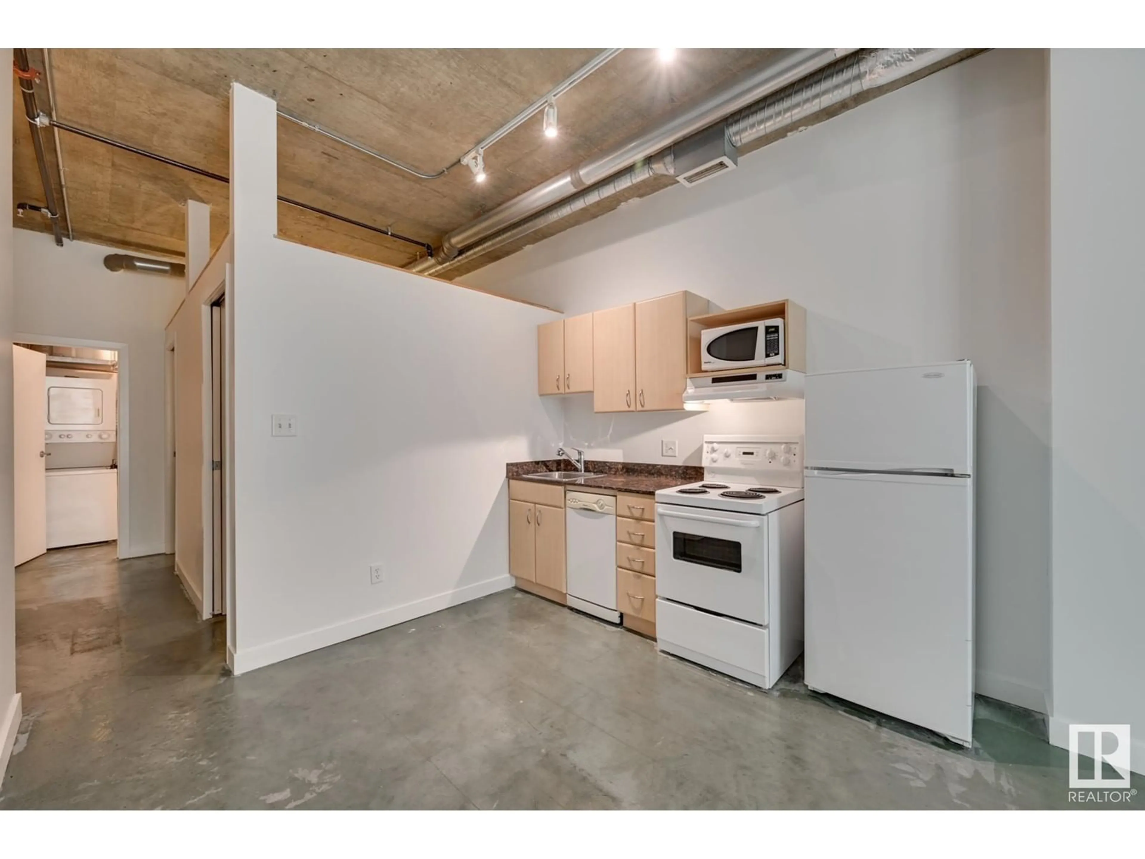 Standard kitchen, cement floor for #506 10024 JASPER AV NW, Edmonton Alberta T5J1R9