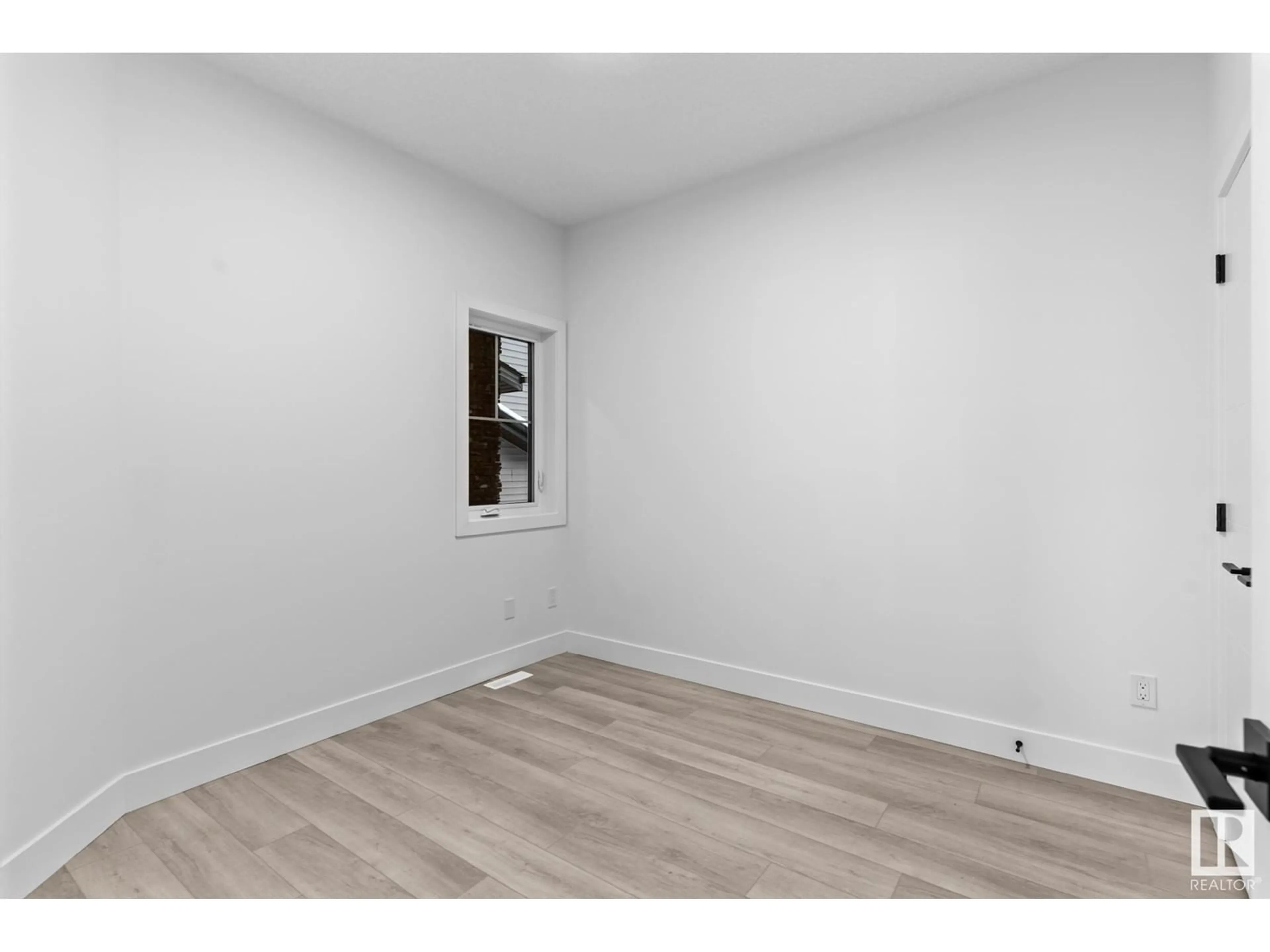 A pic of a room, wood floors for 8820 181 AV NW, Edmonton Alberta T5Z2K6