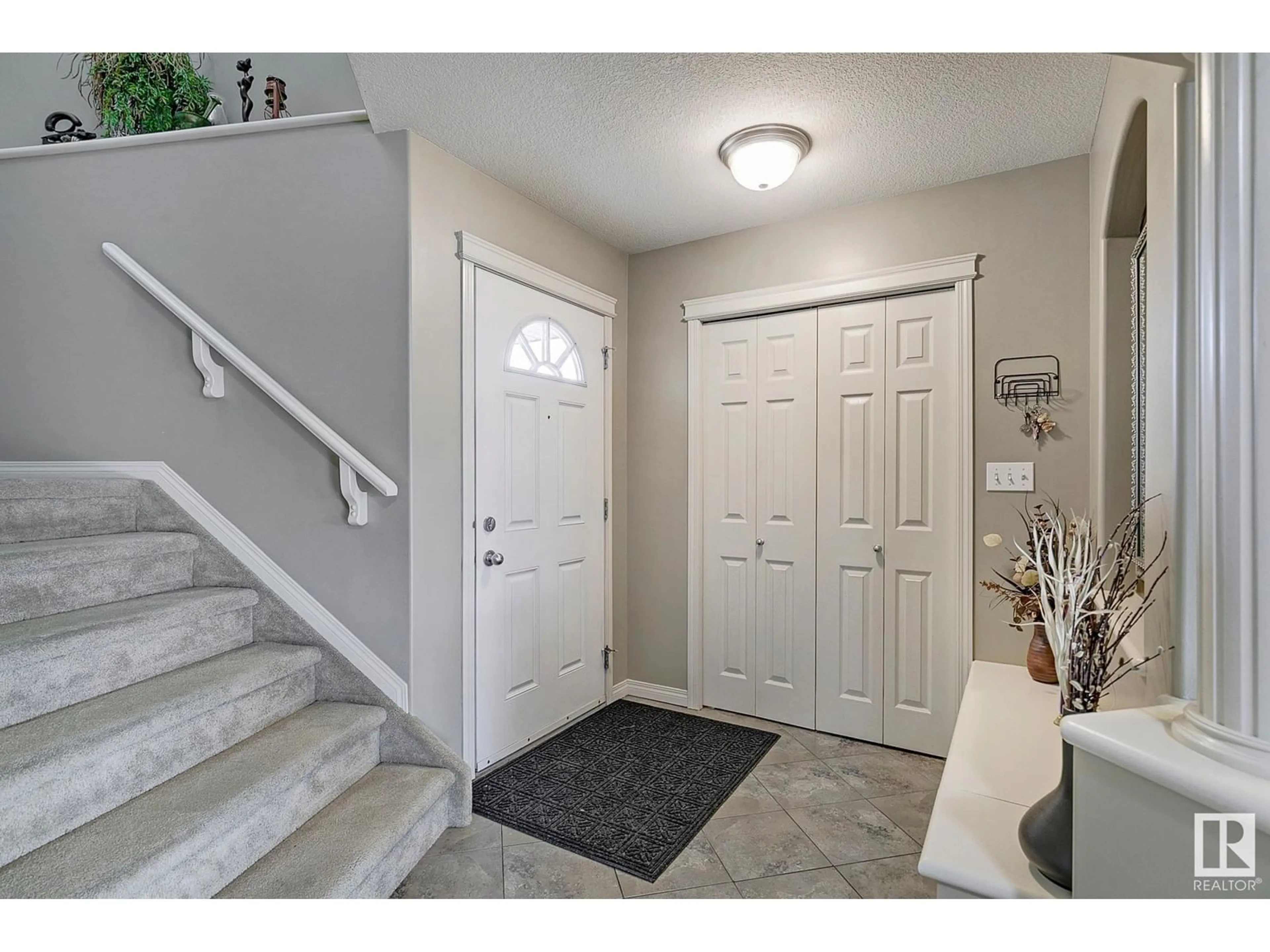 Indoor entryway, carpet floors for 15539 48 ST NW NW, Edmonton Alberta T5Y0B5