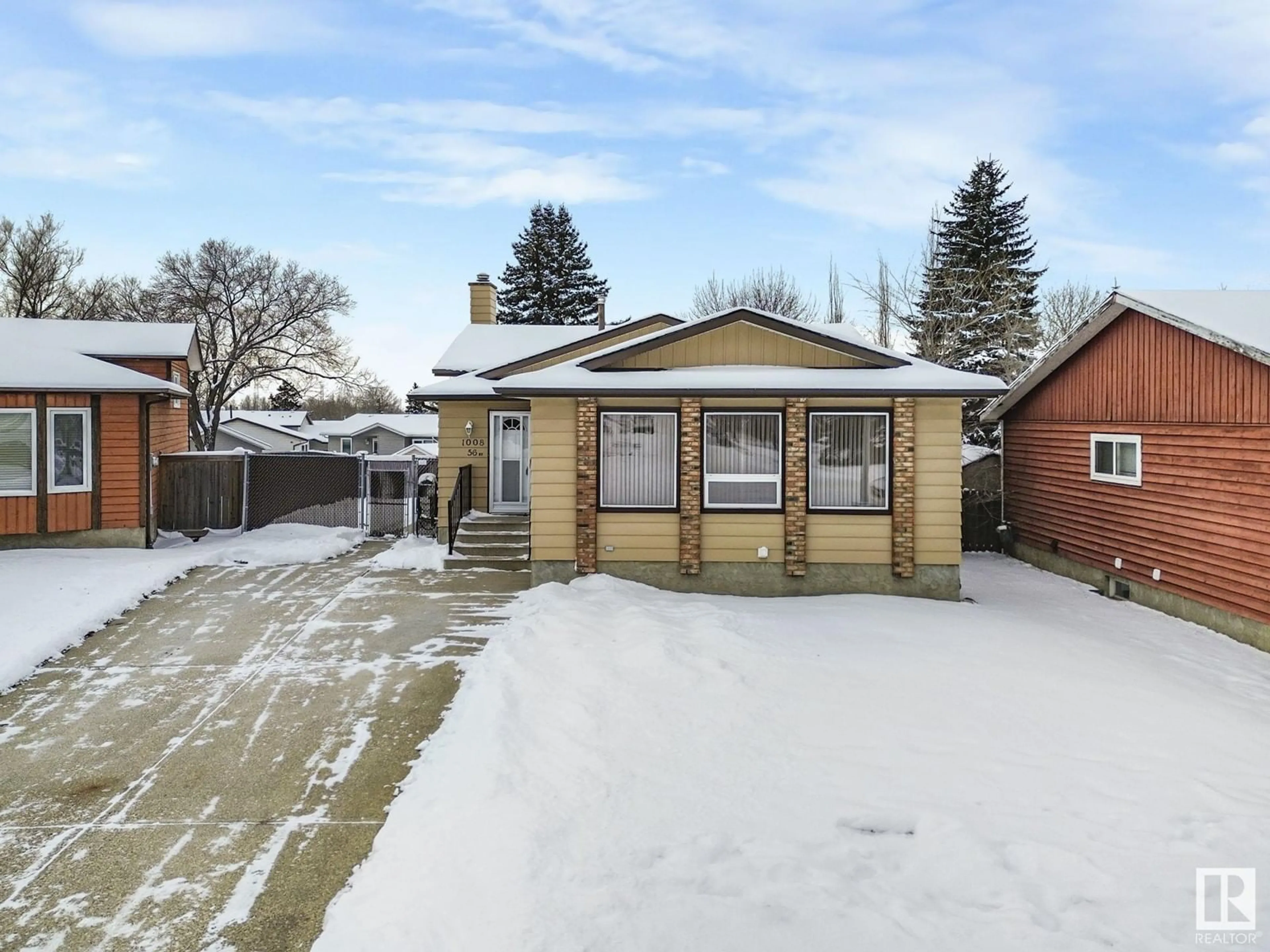 Frontside or backside of a home, the street view for 1008 56 ST NW, Edmonton Alberta T6L1Y3