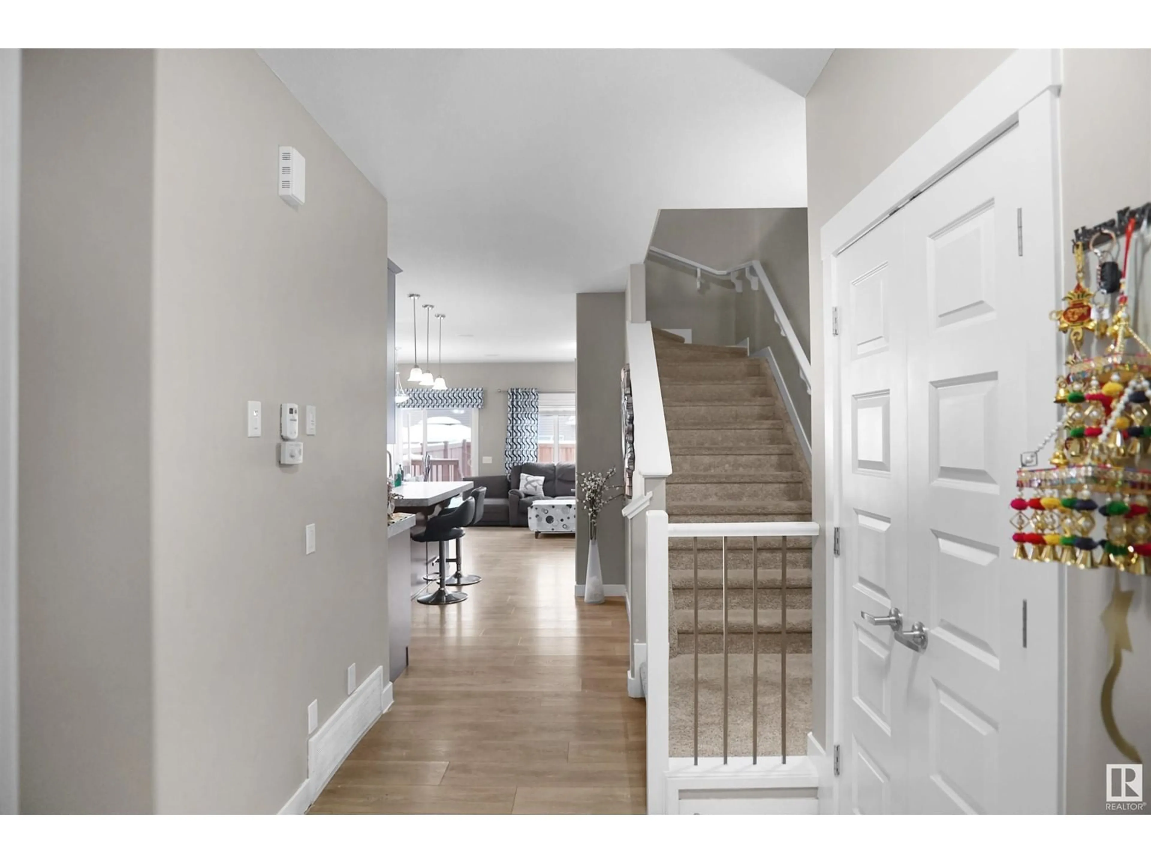 Indoor entryway, wood floors for 16726 64 ST NW, Edmonton Alberta T5Y3P8