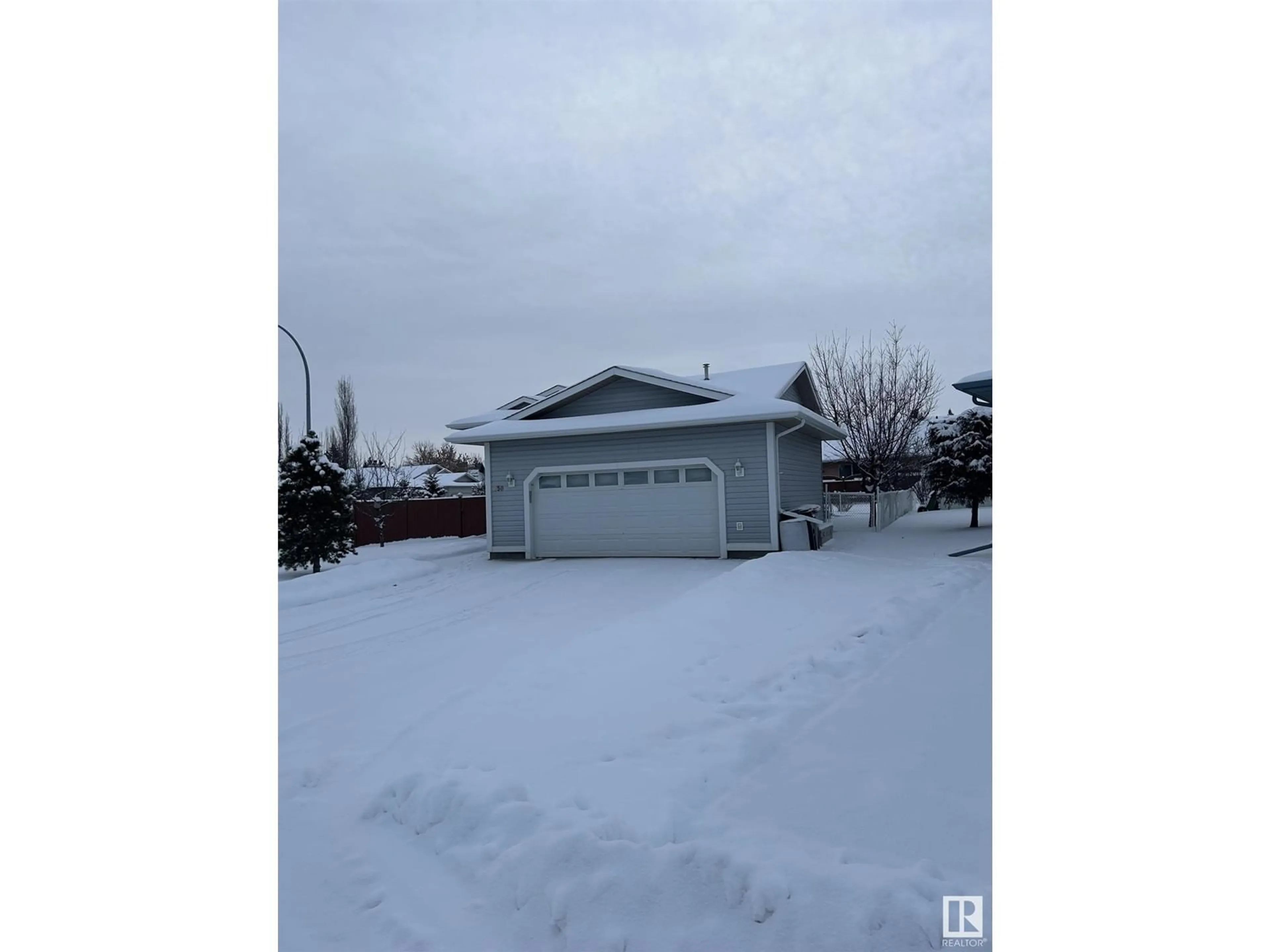 Frontside or backside of a home, the street view for 150 Pipestone DR, Millet Alberta T0C1Z0