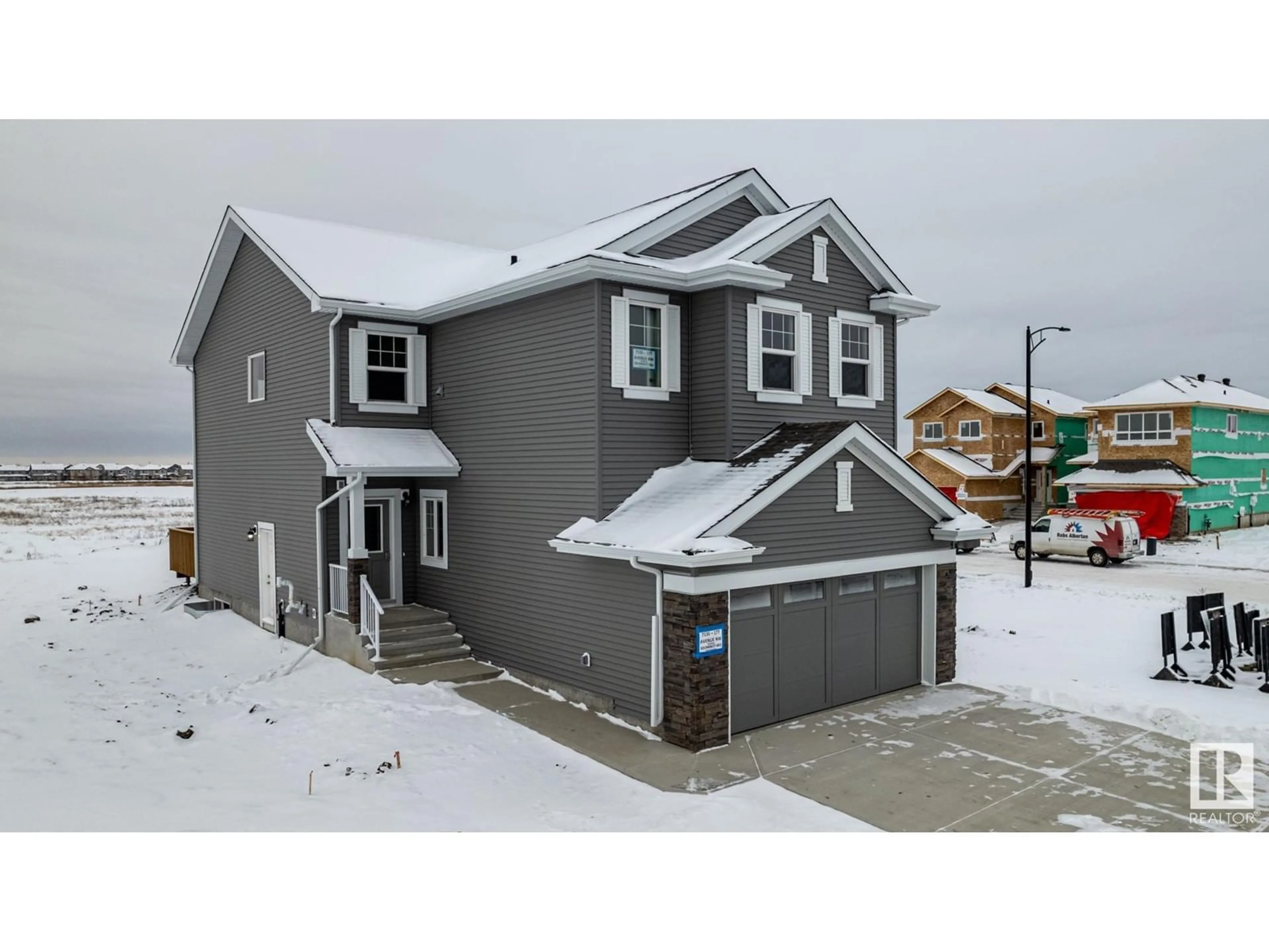 Frontside or backside of a home, the street view for 7135 177 AV NW, Edmonton Alberta T5Z0T8