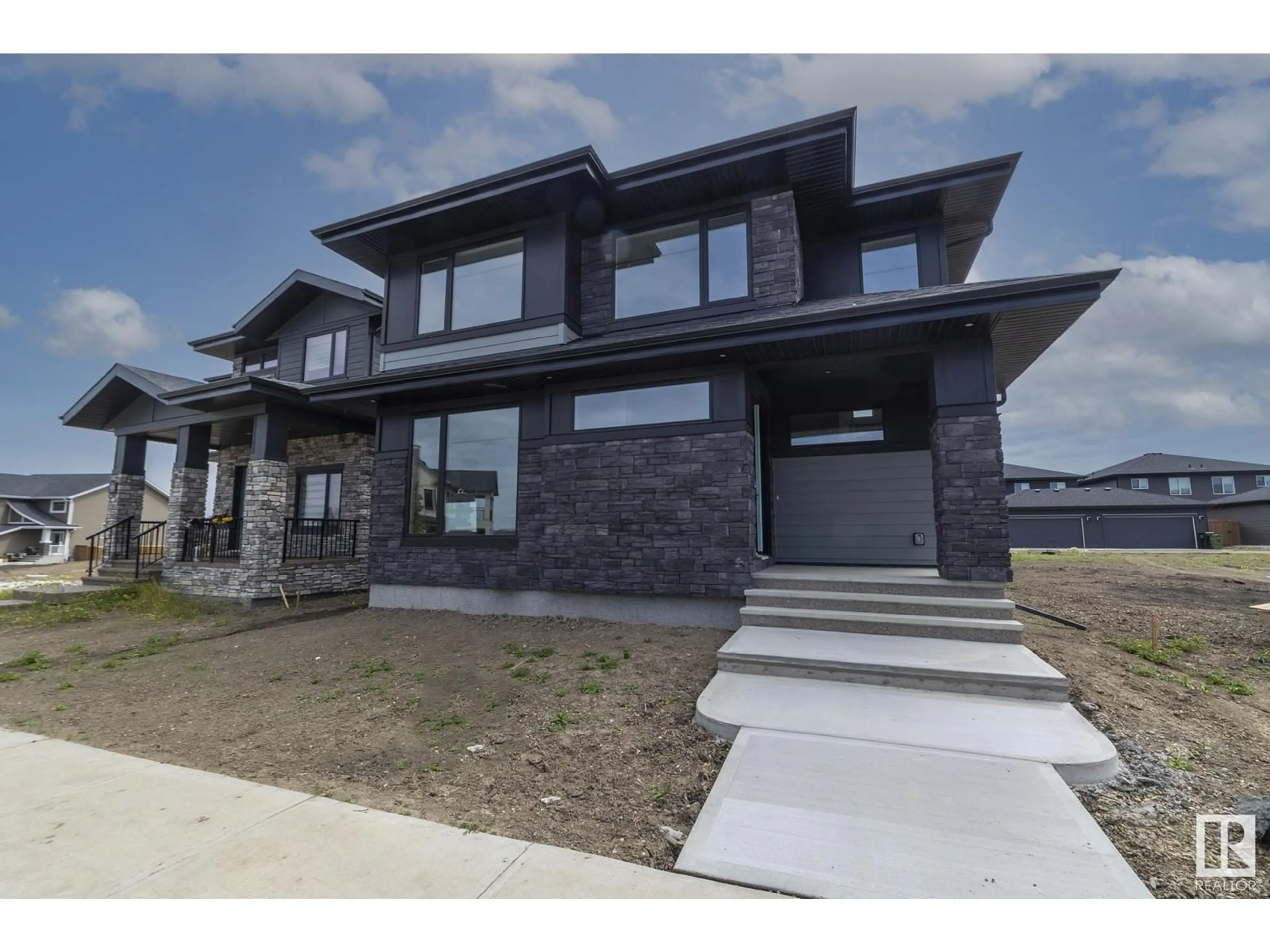 Frontside or backside of a home, mountain for 4541 KNIGHT WD SW, Edmonton Alberta T6W4B7