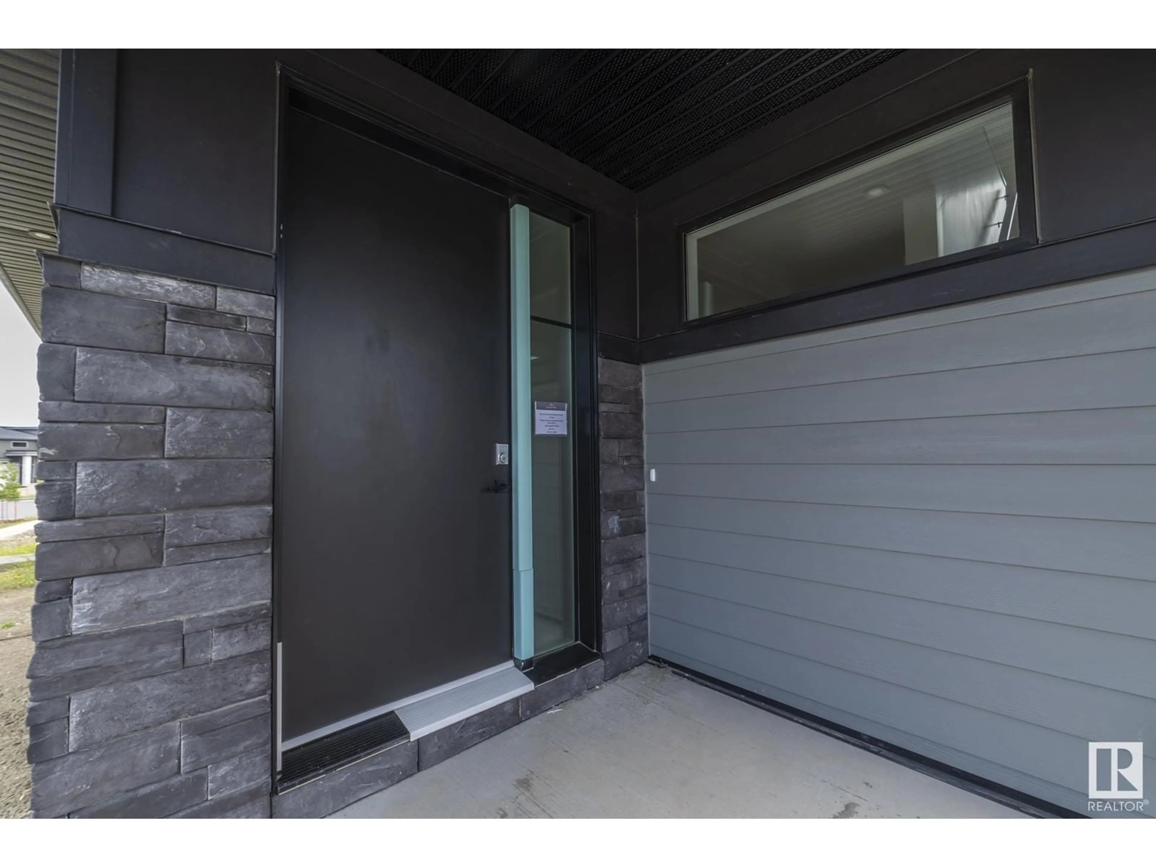 Indoor entryway, cement floor for 4541 KNIGHT WD SW, Edmonton Alberta T6W4B7