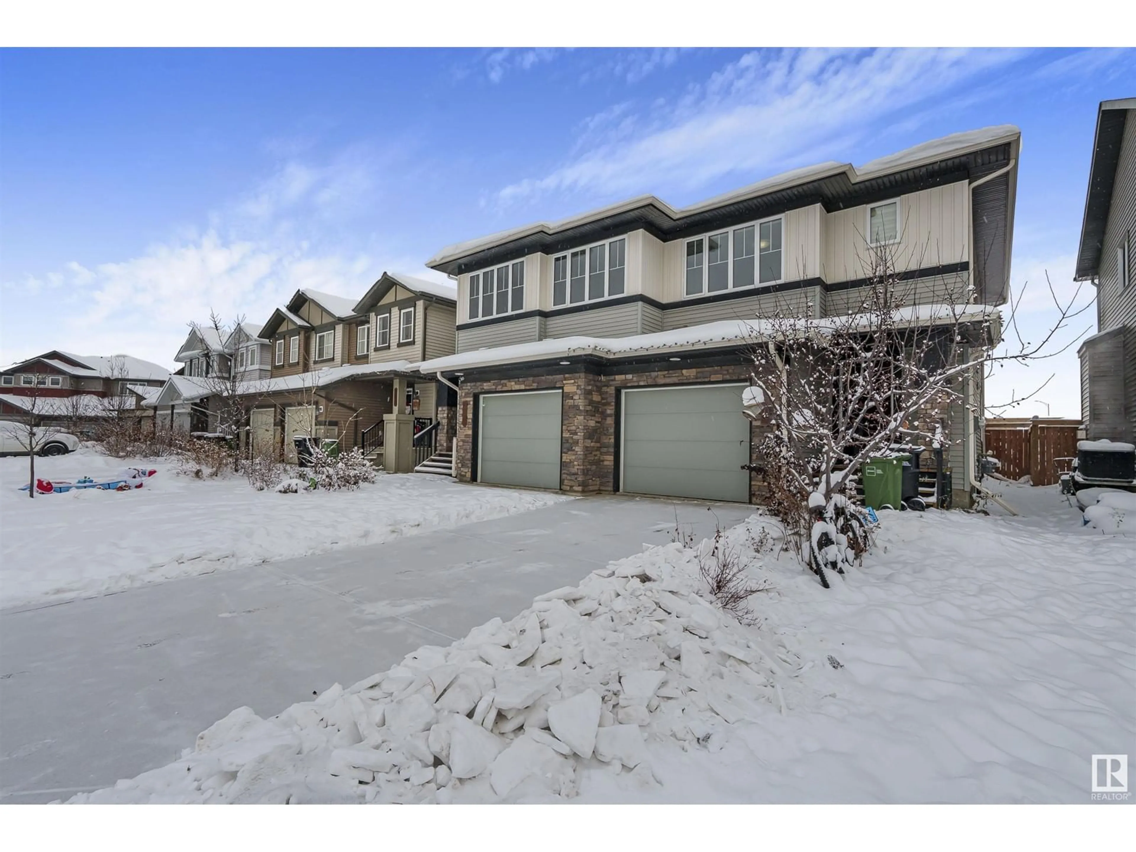 A pic from exterior of the house or condo, the street view for 2304 CASEY CR SW, Edmonton Alberta T6W3M9