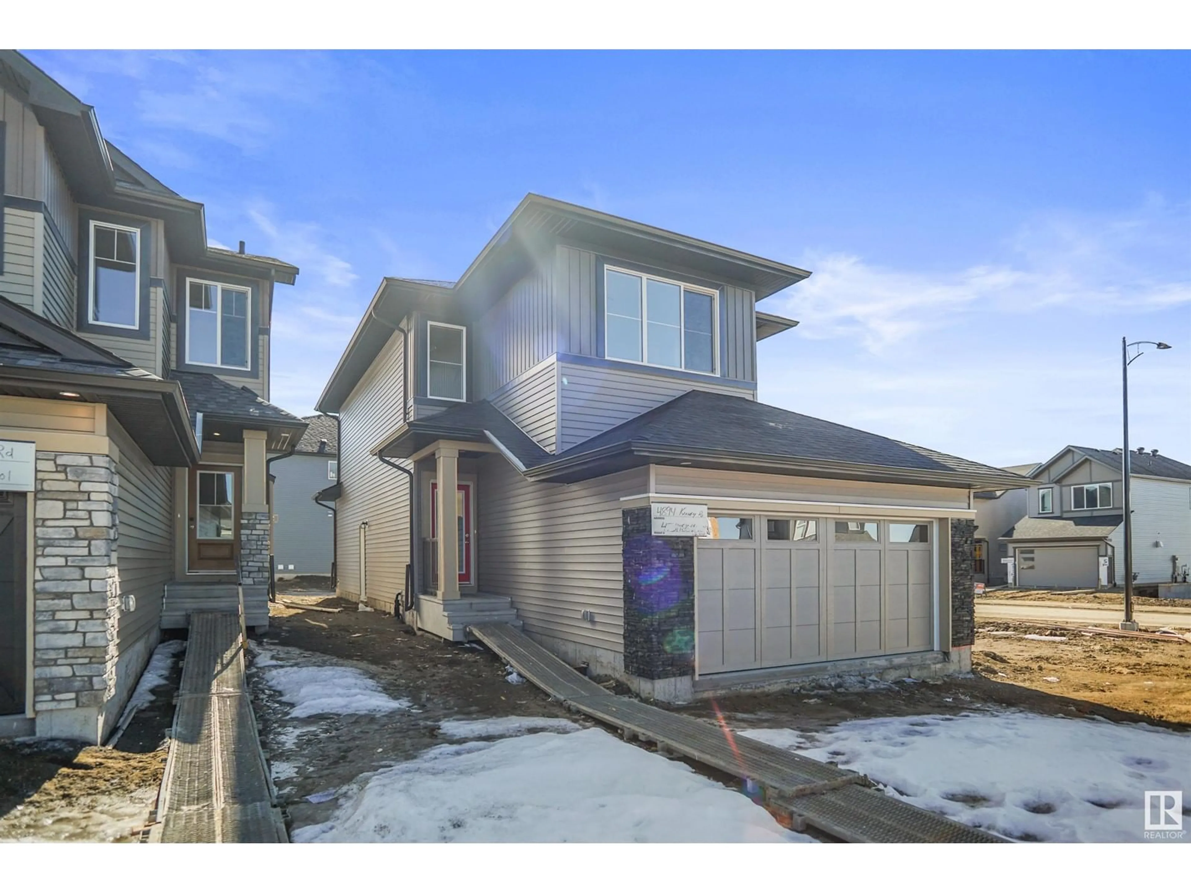 Frontside or backside of a home, the street view for 22825 82A AV NW, Edmonton Alberta T5T4H5