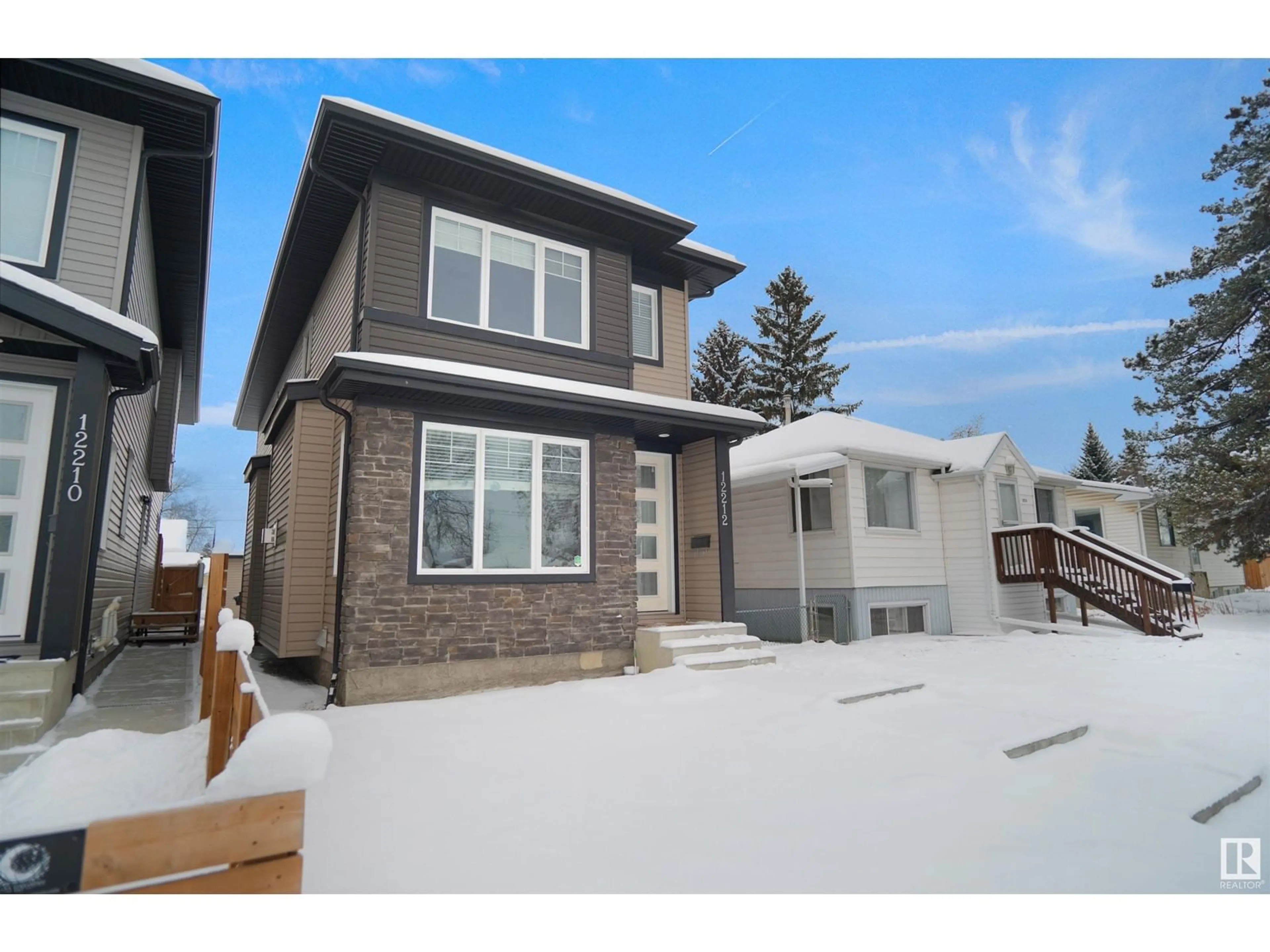 Frontside or backside of a home, the fenced backyard for 12212 124 ST NW, Edmonton Alberta T5L0N2