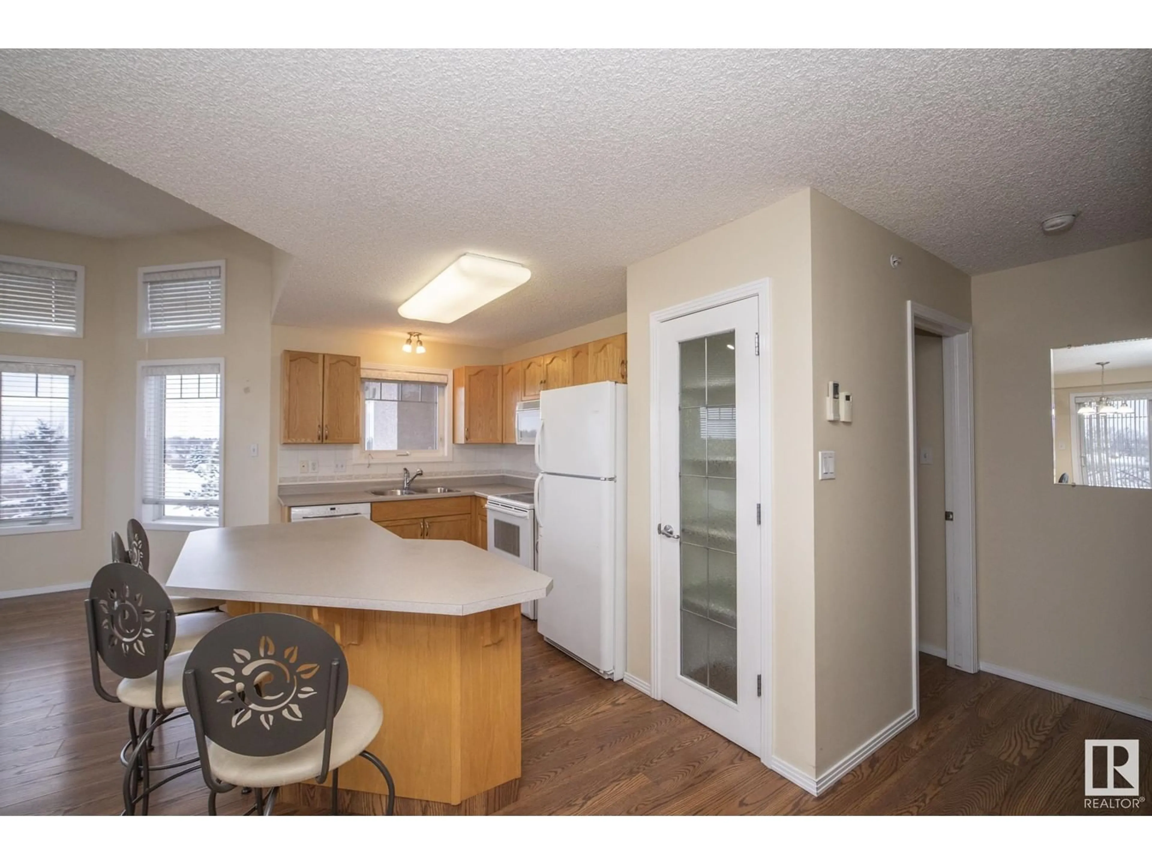 Standard kitchen, wood floors for #417 2420 108 ST NW NW, Edmonton Alberta T6J7J3