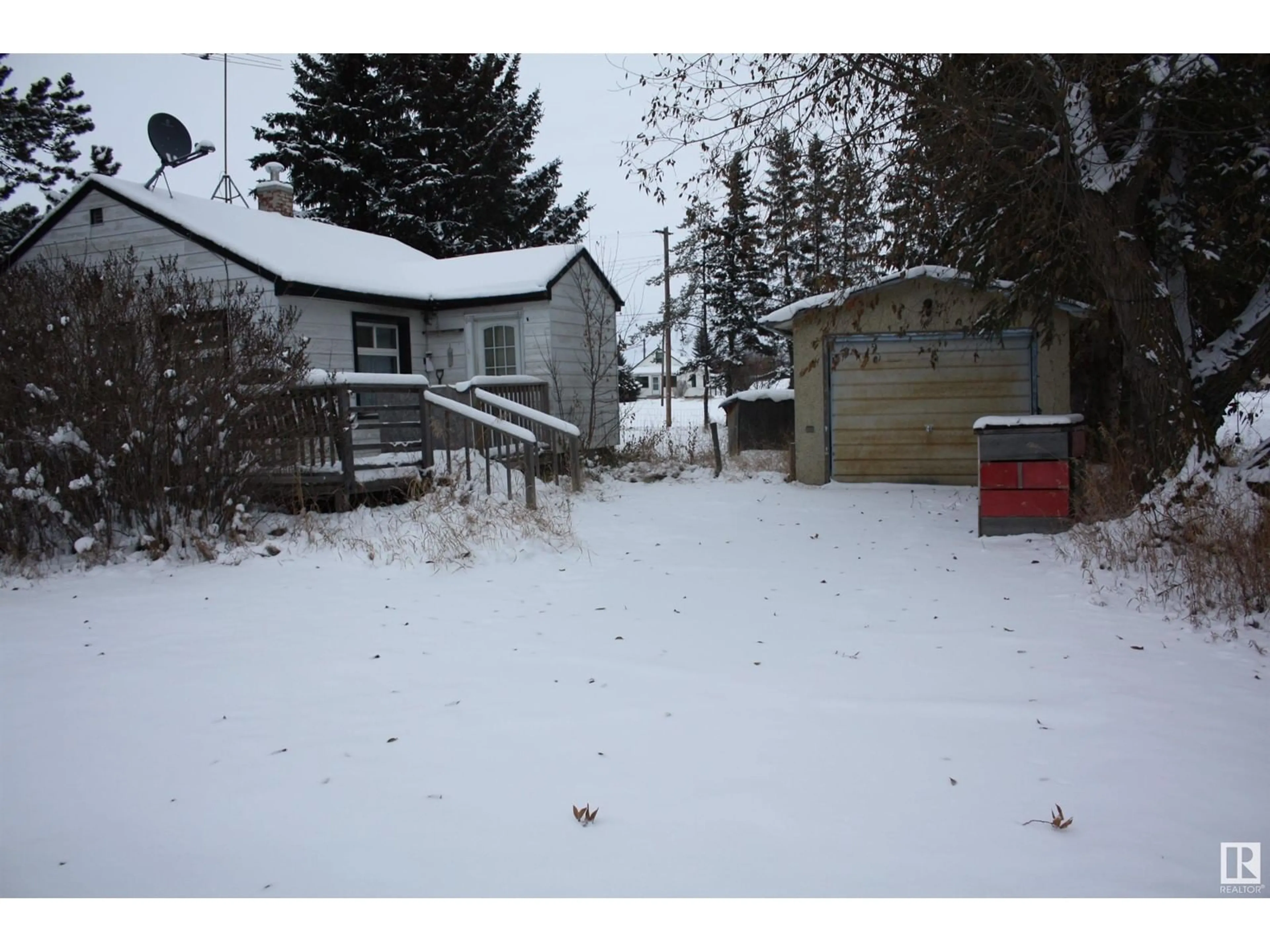 Frontside or backside of a home, the fenced backyard for 5203 49 STREET, Waskatenau Alberta T0A3P0