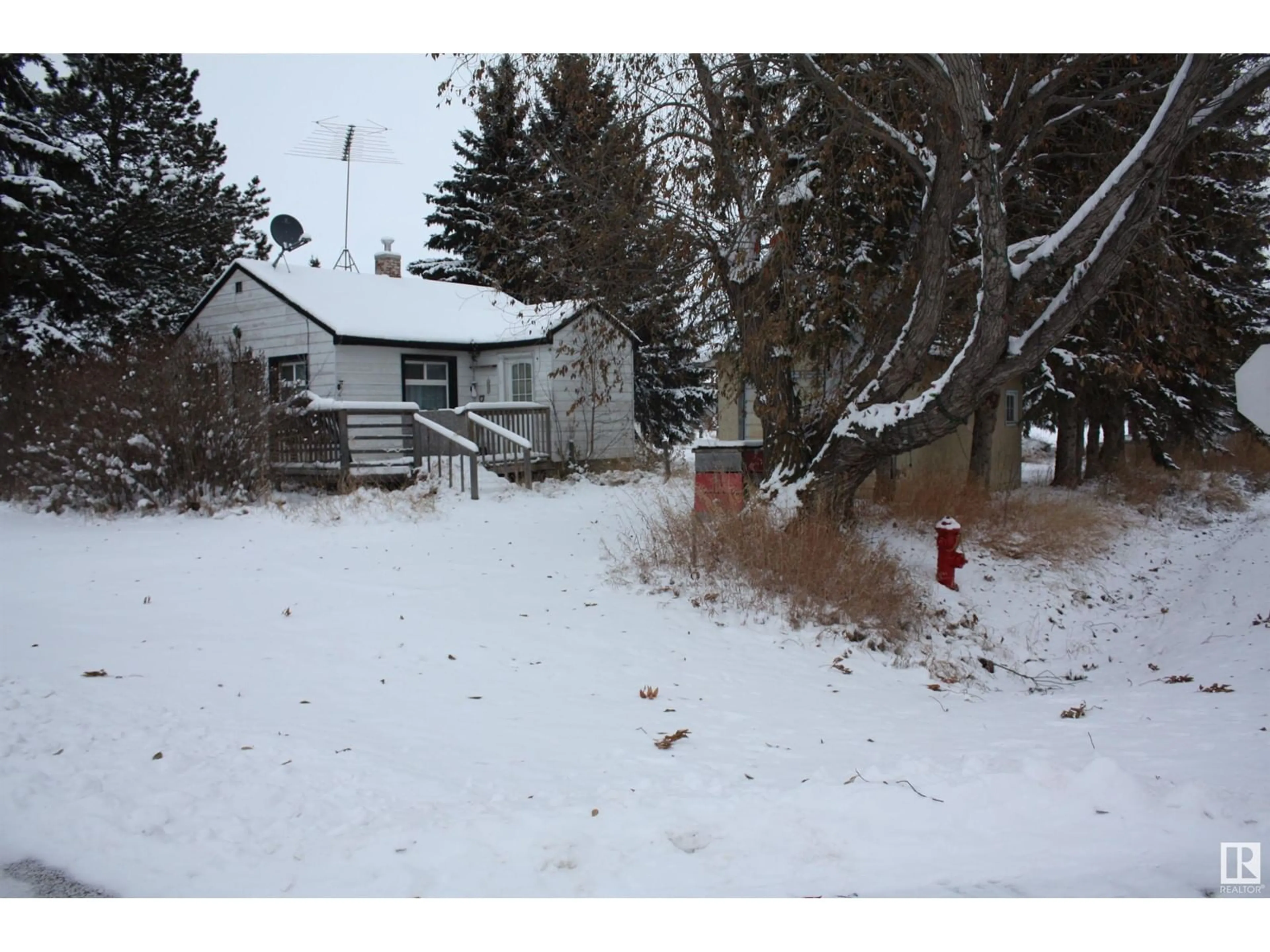 A pic from exterior of the house or condo, the fenced backyard for 5203 49 STREET, Waskatenau Alberta T0A3P0