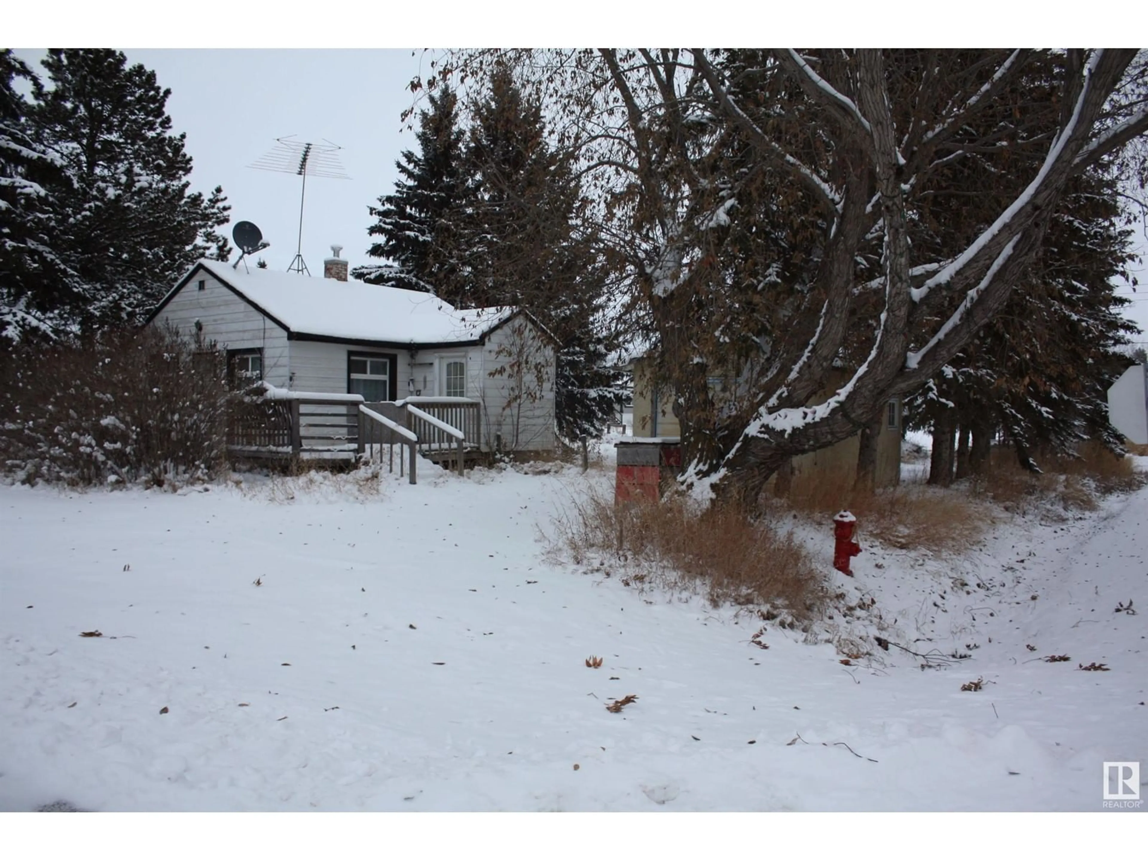 A pic from exterior of the house or condo, the fenced backyard for 5203 49 STREET, Waskatenau Alberta T0A3P0