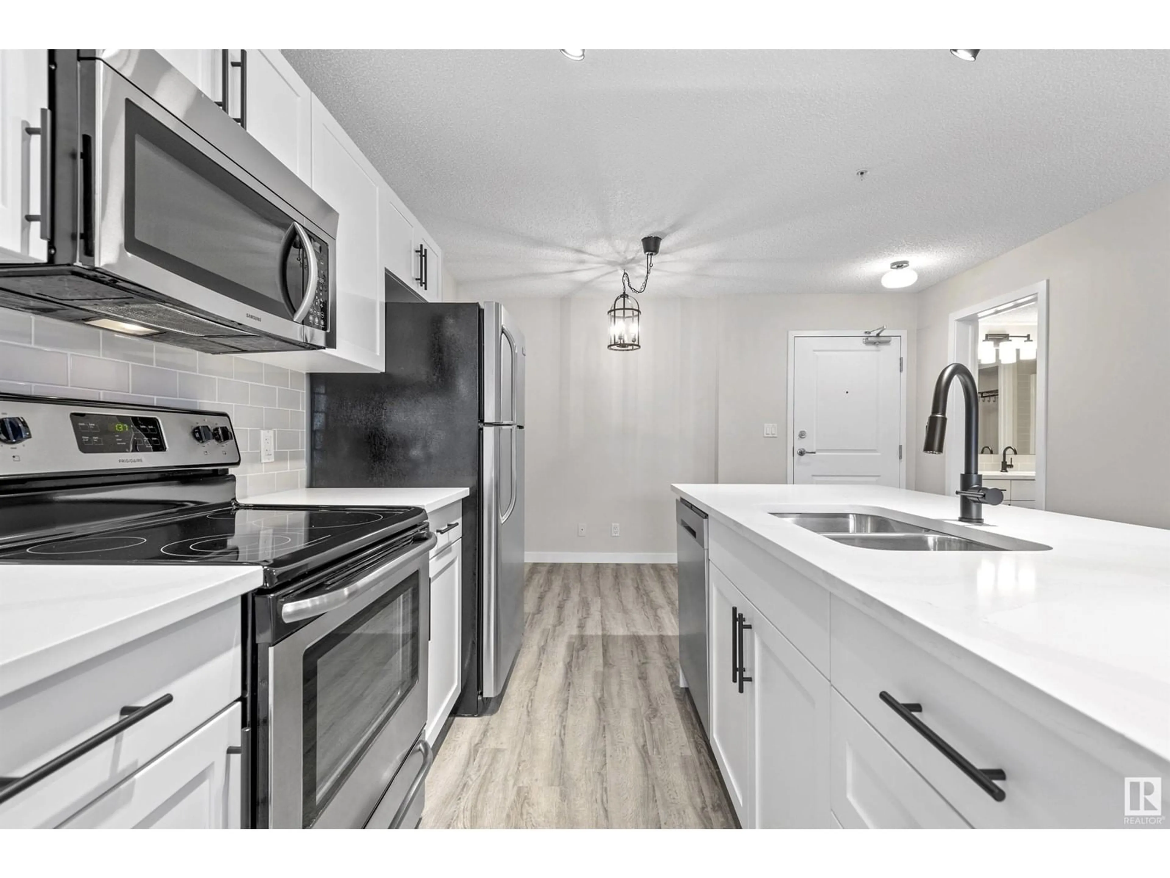 Standard kitchen, wood floors for #315 105 AMBLESIDE DR SW, Edmonton Alberta T6W0J4