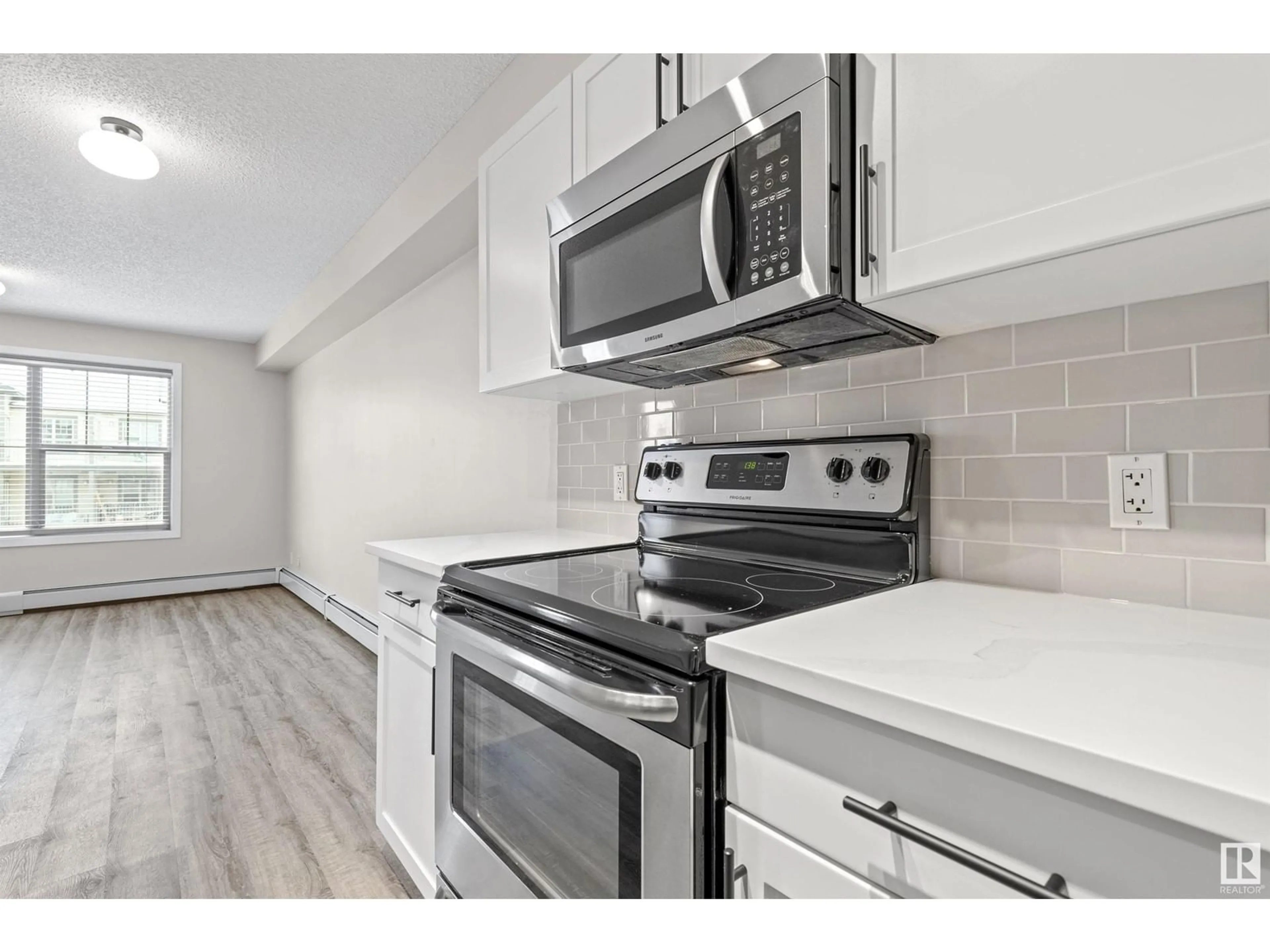 Standard kitchen, wood floors for #315 105 AMBLESIDE DR SW, Edmonton Alberta T6W0J4