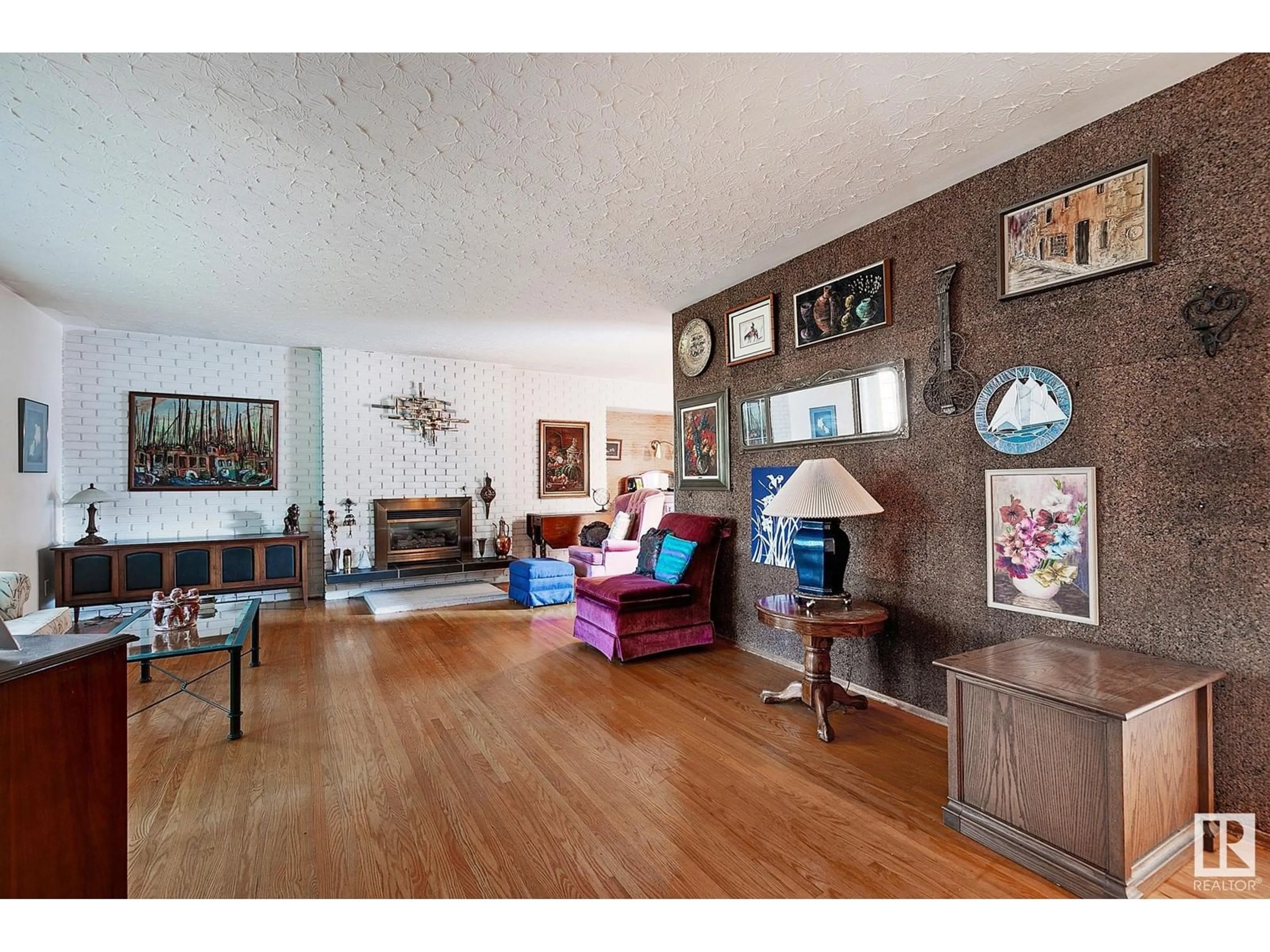 Living room, wood floors for 10635 59 ST NW, Edmonton Alberta T6A2K5