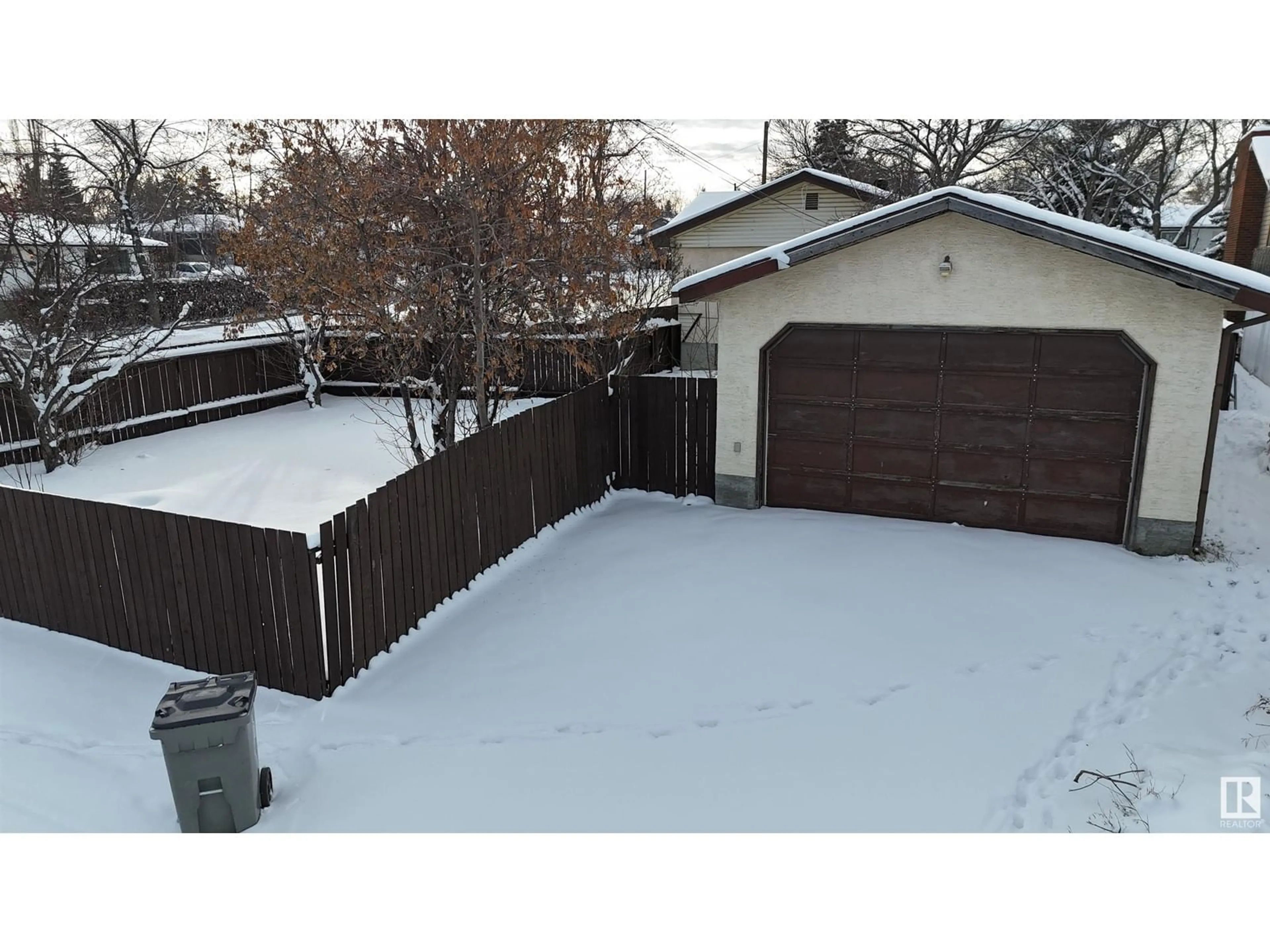 Frontside or backside of a home, the fenced backyard for 5404 48 ST, Drayton Valley Alberta T7A1C2