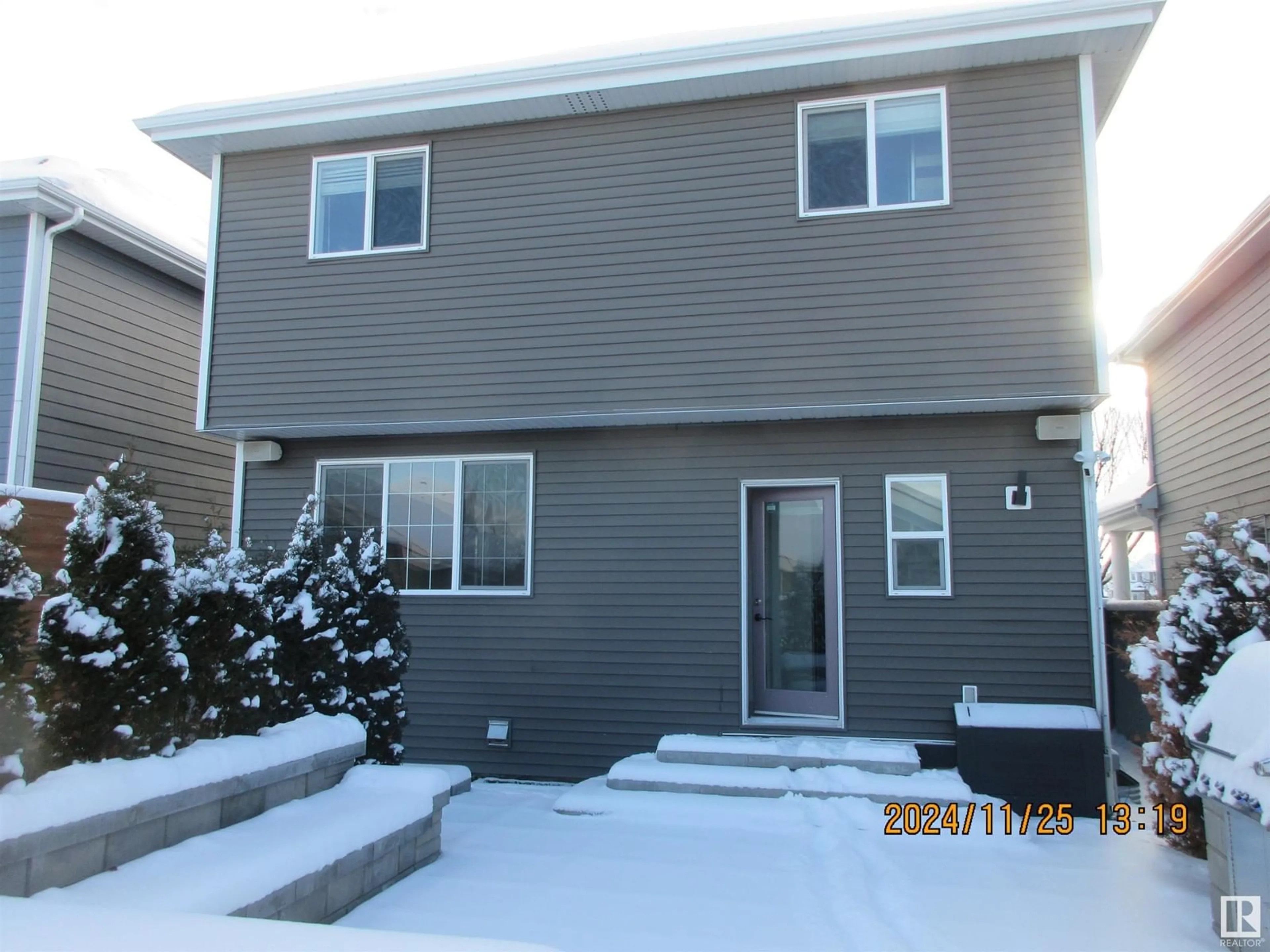 A pic from exterior of the house or condo, the front or back of building for 7724 SUMMERSIDE GRANDE BV SW, Edmonton Alberta T8A4Y6